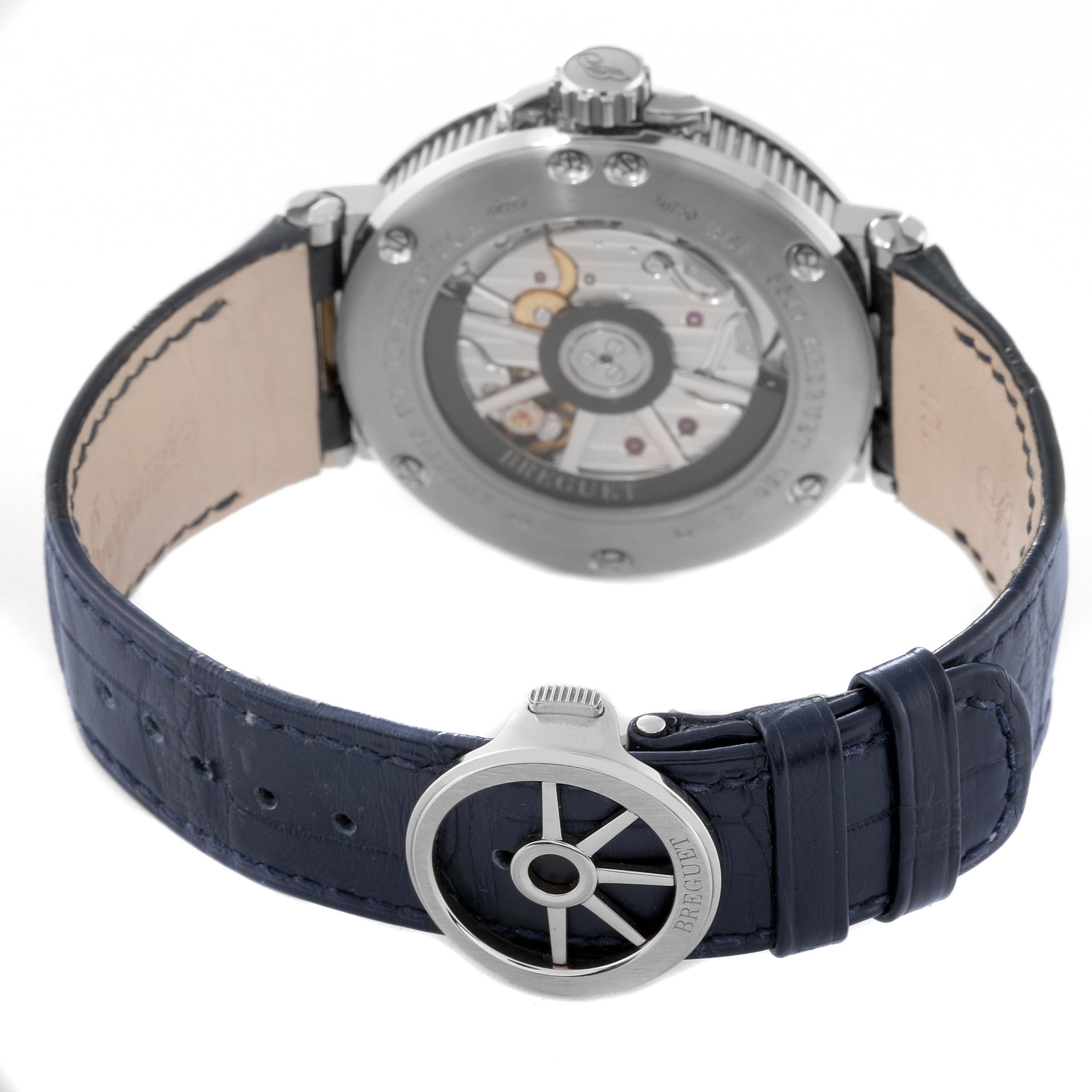 The image shows the back view of a Breguet Marine 5517BB/Y2/9ZU Men's White Gold Blue Dial 5517BB/Y2/9ZU Men's White Gold Blue Dial watch, highlighting the movement and blue leather strap.