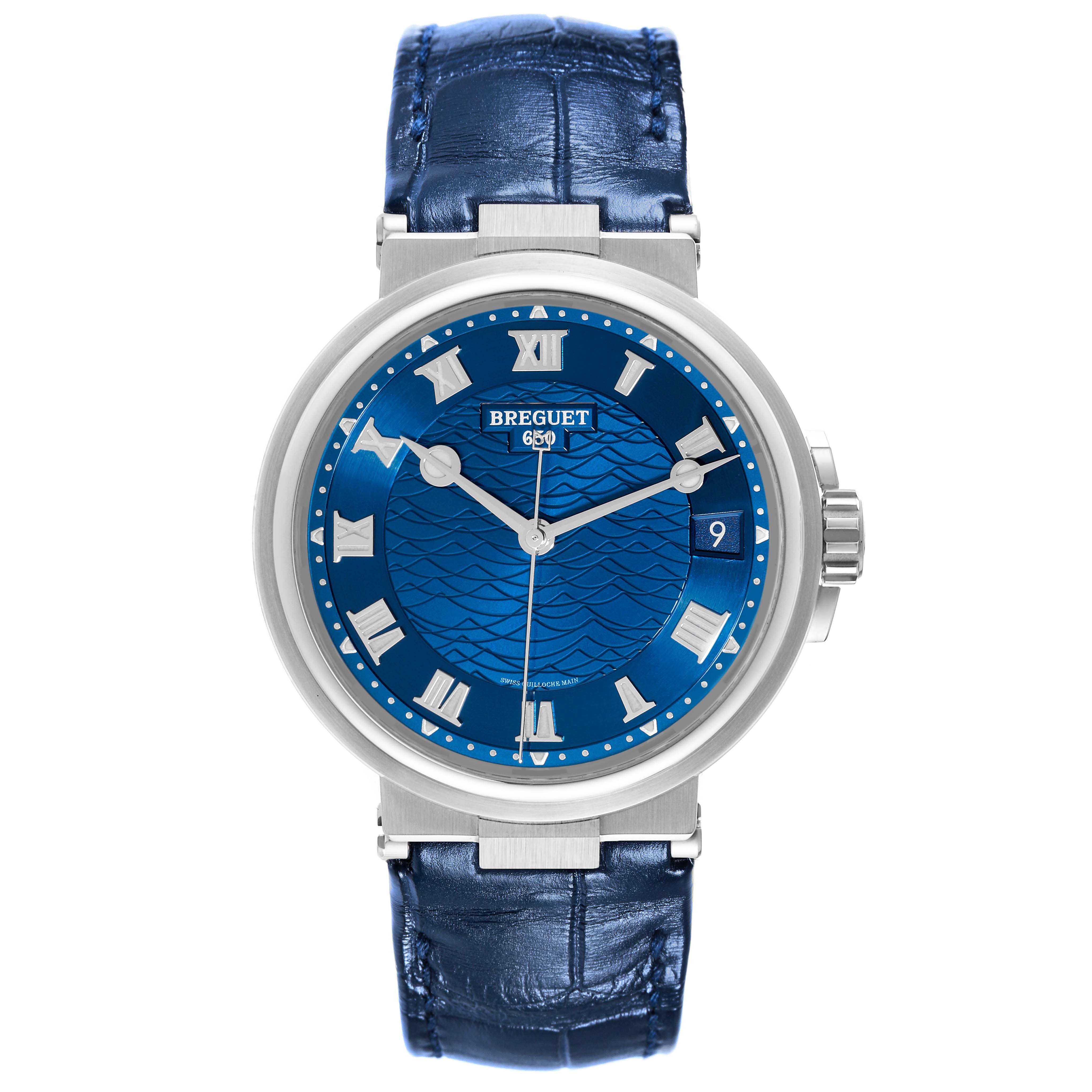 The Breguet Marine 5517BB/Y2/9ZU Men's White Gold Blue Dial 5517BB/Y2/9ZU Men's White Gold Blue Dial model is shown from a front angle, displaying the watch face, hands, date window, and strap.