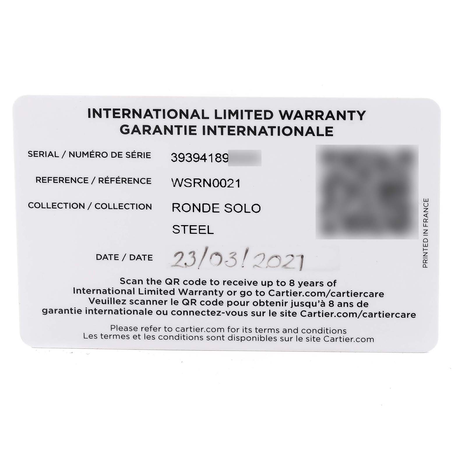 The image shows the international limited warranty card for a Cartier Ronde WSRN0021 Men
s Stainless Steel Silver Dial WSRN0021 Men
s Stainless Steel Silver Dial Solo watch, detailing the serial number, reference, and date.