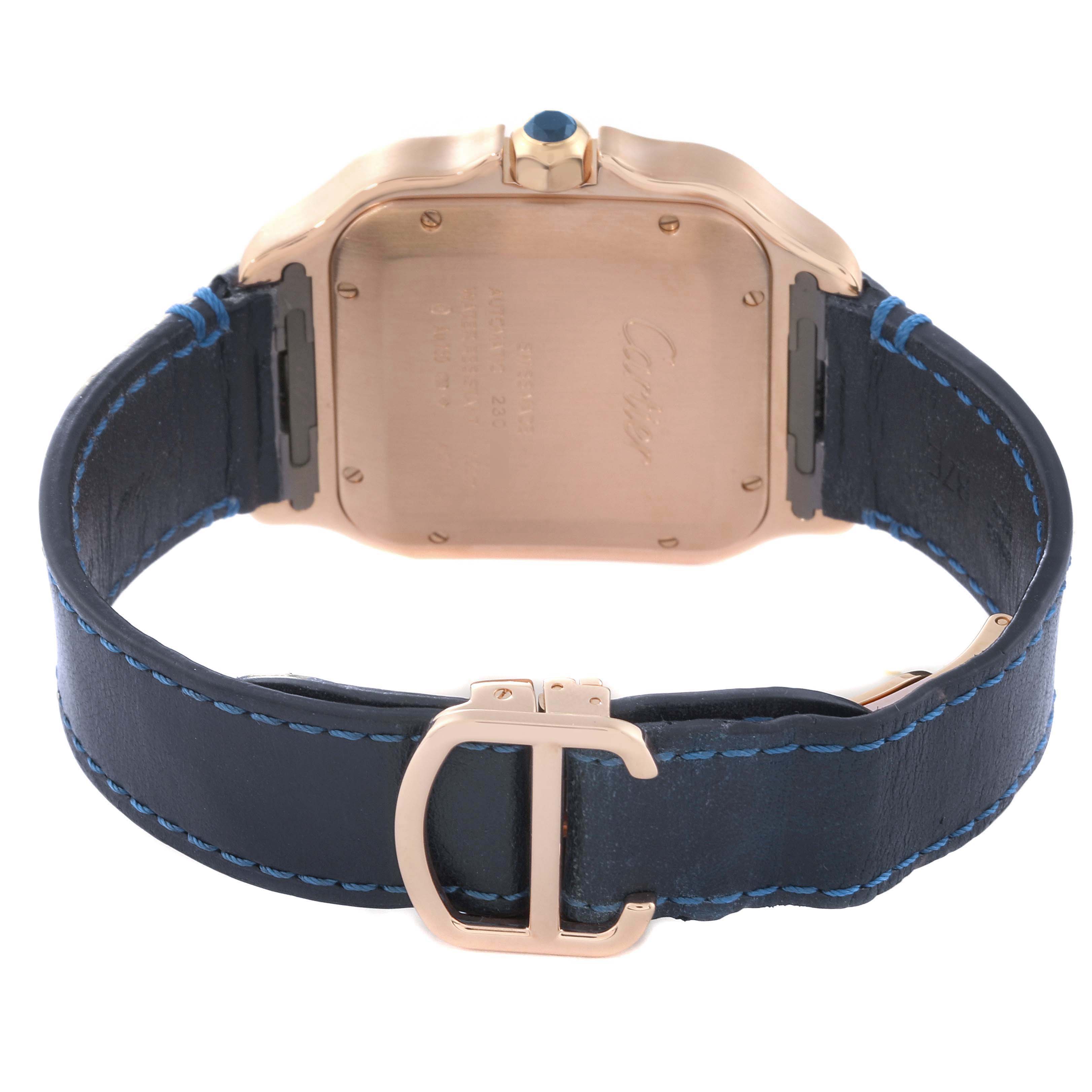 This image shows the back case, crown, and leather strap with the clasp of a Cartier Santos WGSA0011 Men's Rose Gold Silver Dial WGSA0011 Men's Rose Gold Silver Dial watch.