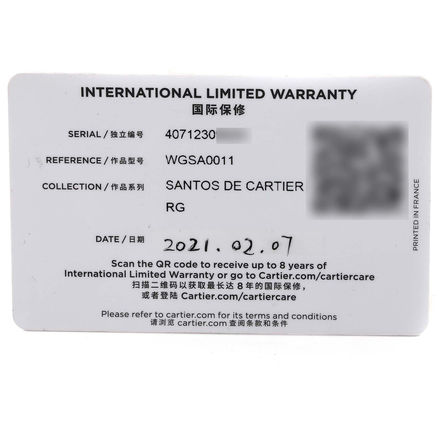 This image shows the International Limited Warranty card for the Santos de Cartier WGSA0011 model, including serial, reference, and date.