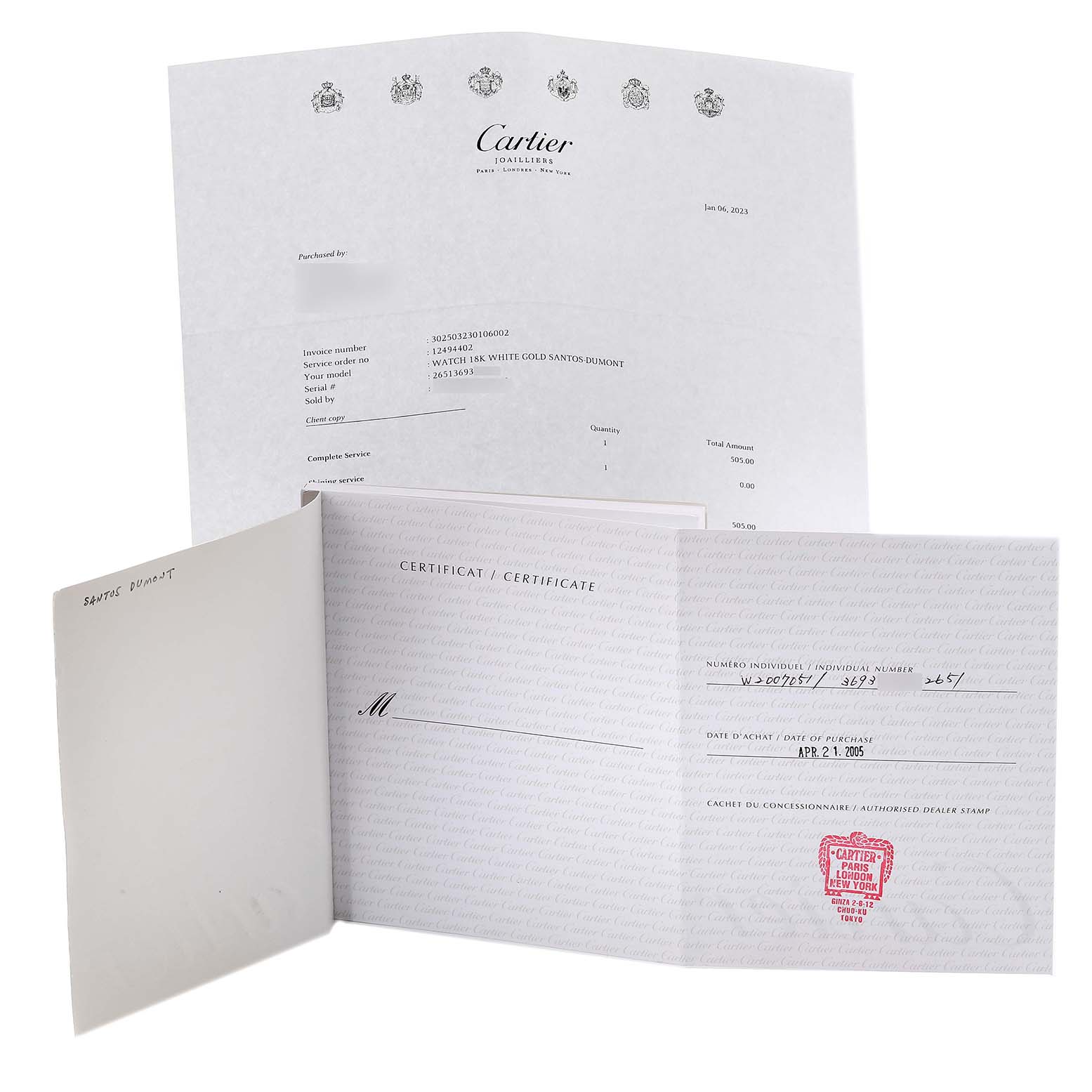 The image shows the certificate and paperwork for a Cartier Santos Dumont W2007051 Men's White Gold Silver Dial W2007051 Men's White Gold Silver Dial watch.