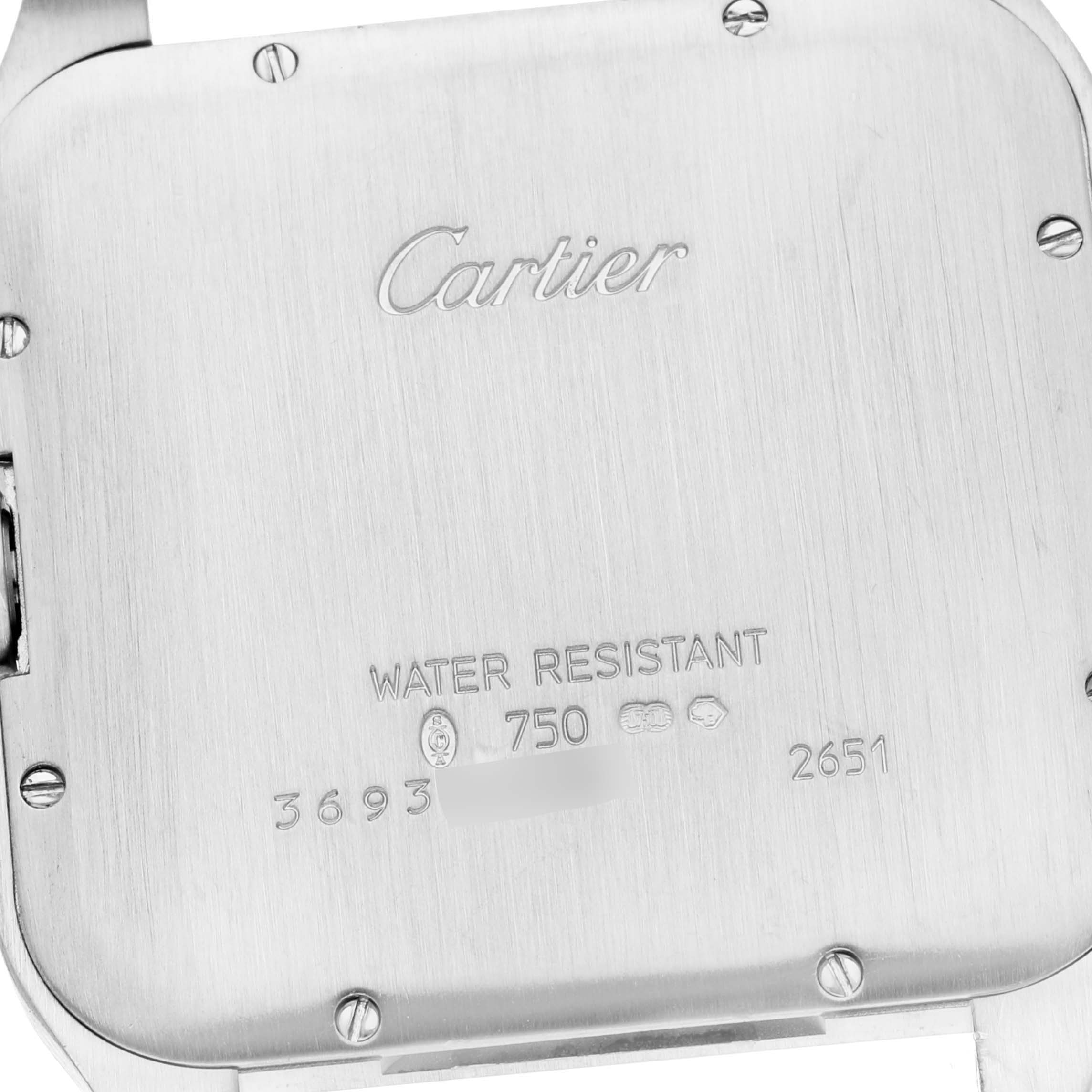 This image shows the back case of a Cartier Santos Dumont W2007051 Men's White Gold Silver Dial W2007051 Men's White Gold Silver Dial watch, featuring branding, water resistance, and hallmark engravings.