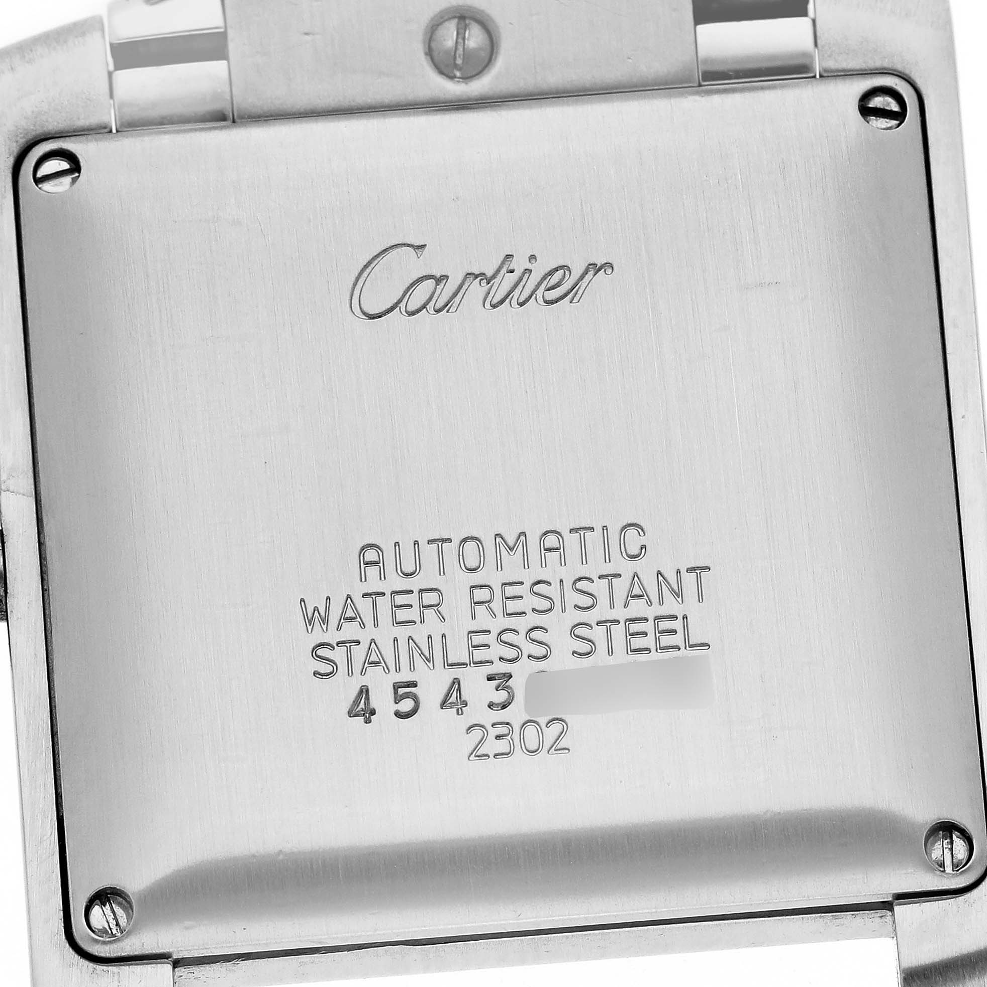 The image shows the back case of a Cartier Tank Francaise W51002Q3 Men's Stainless Steel Silver Dial W51002Q3 Men's Stainless Steel Silver Dial watch, displaying engravings and screws.