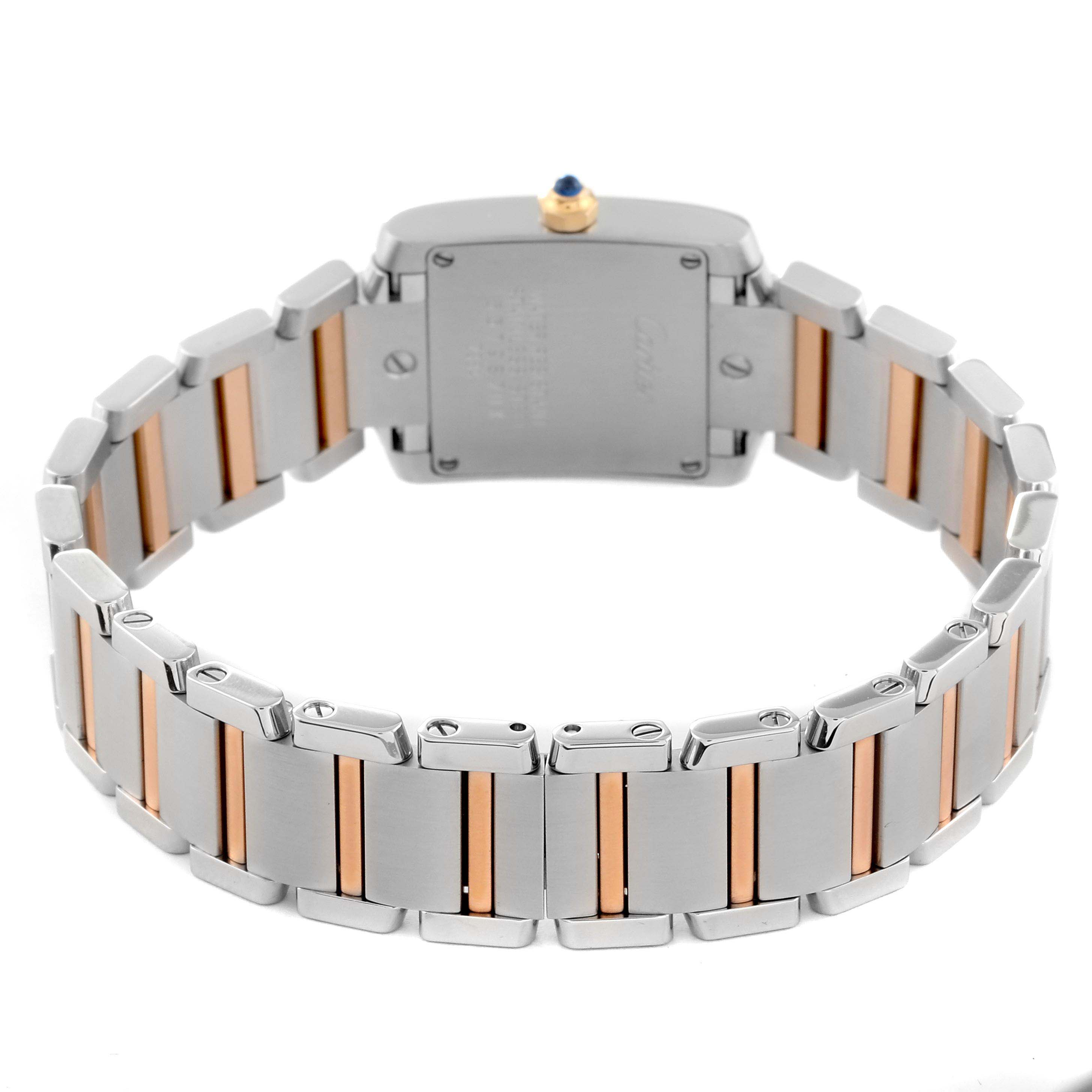 The image shows the back and bracelet of a Cartier Tank Française watch at a rear angle.
