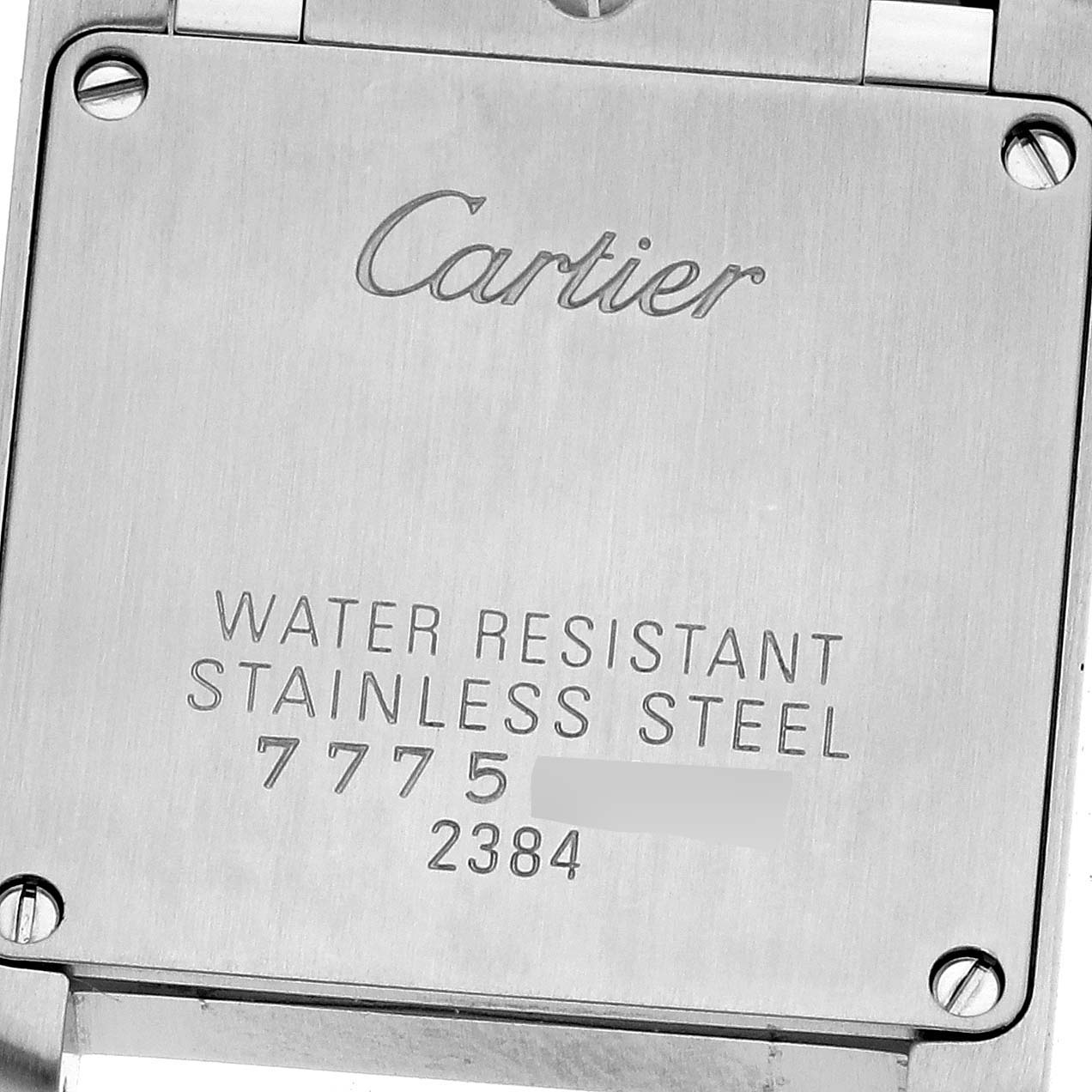 This image shows the case back of a Cartier Tank Française watch, highlighting its water resistance and stainless steel design.