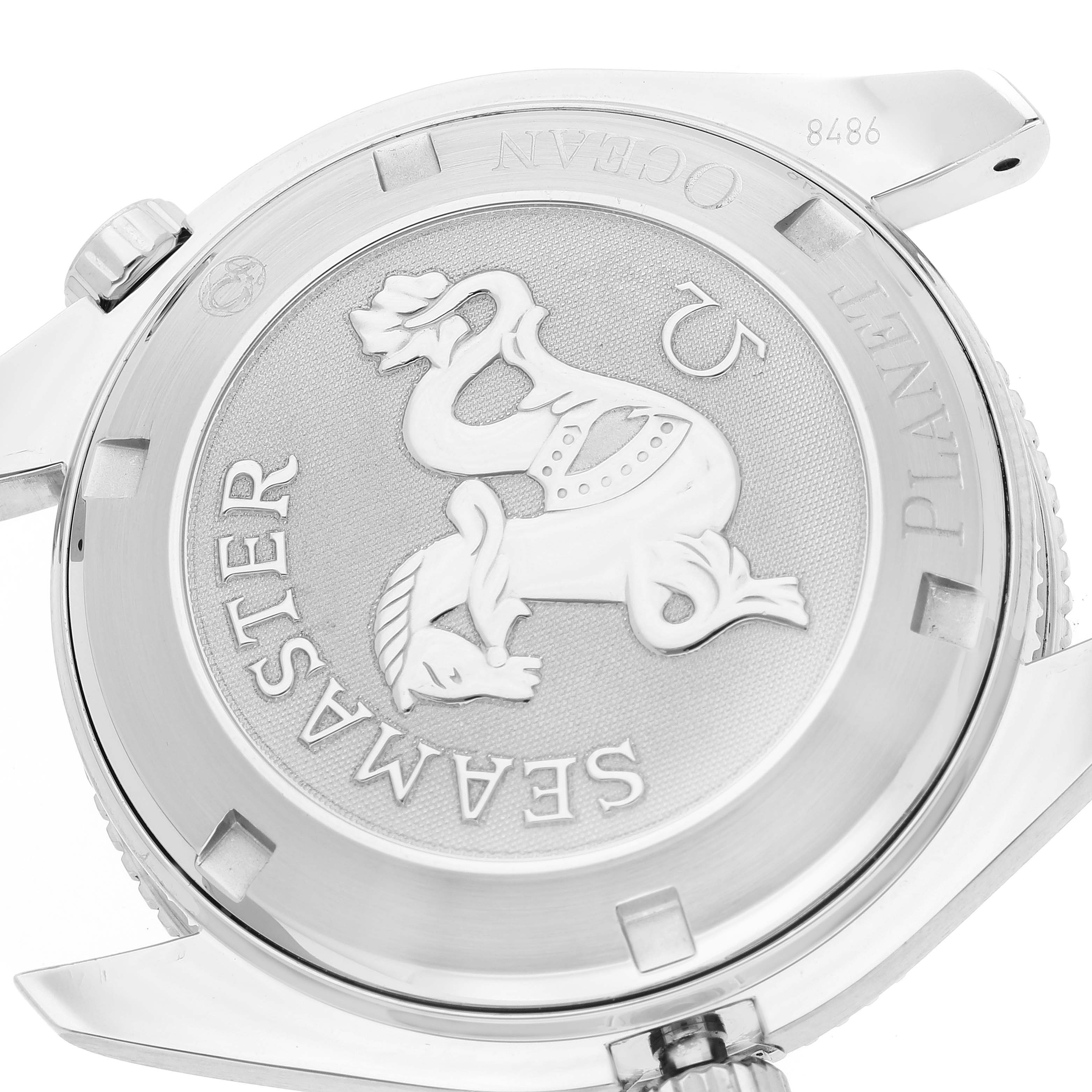 This image shows the case back of the Omega Seamaster Planet Ocean watch, featuring the brand's logo and details.