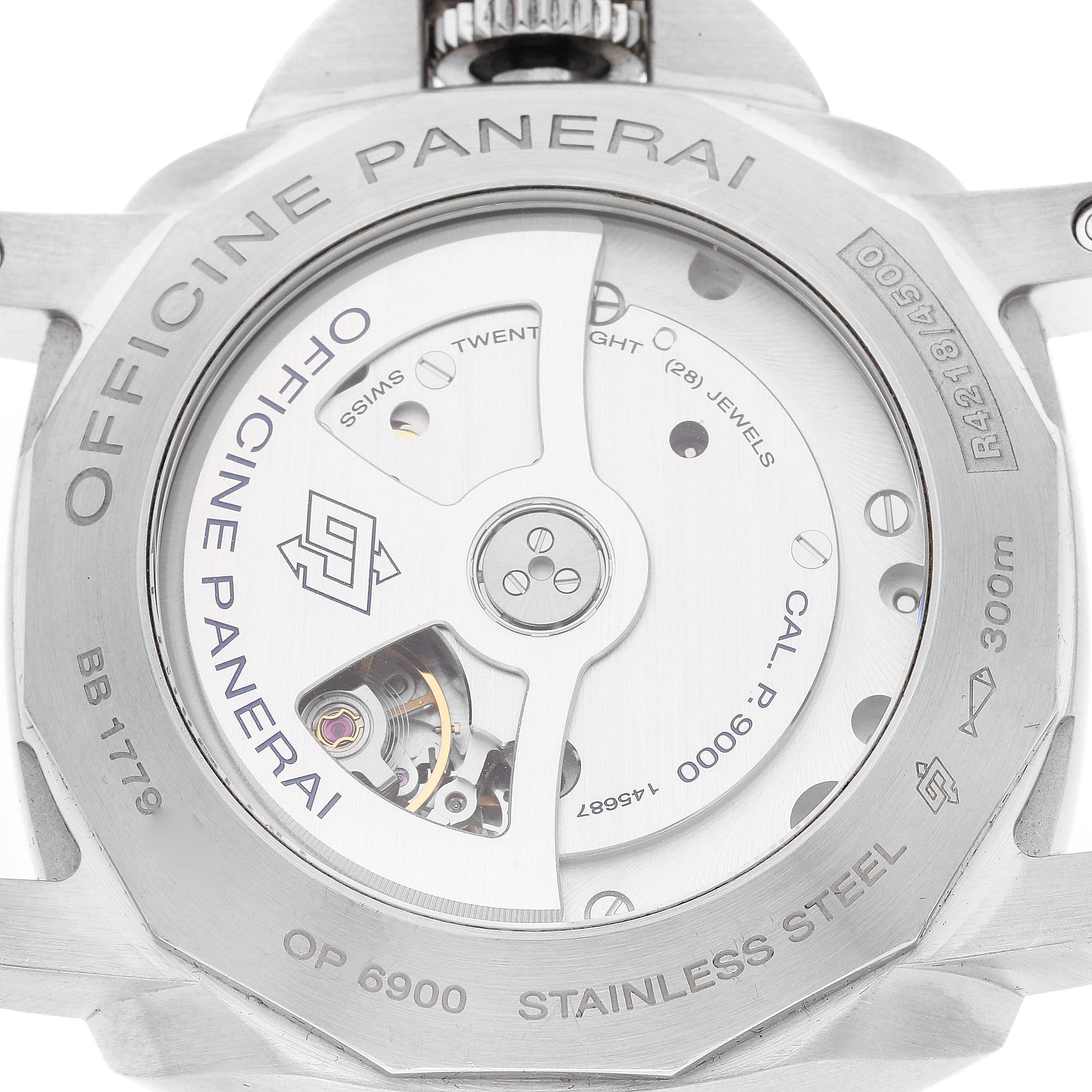 The image shows the back of a Panerai Luminor PAM00312 Men
s Stainless Steel Black Dial PAM00312 Men
s Stainless Steel Black Dial watch, highlighting the movement and markings on the stainless steel case.