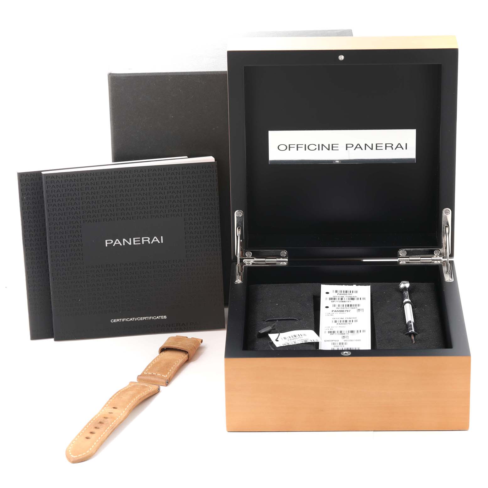 The image shows the packaging, additional strap, certificates, and tools for a Panerai Luminor PAM00797 Men
s Titanium Brown Dial PAM00797 Men
s Titanium Brown Dial watch with an open box, viewed from the front.