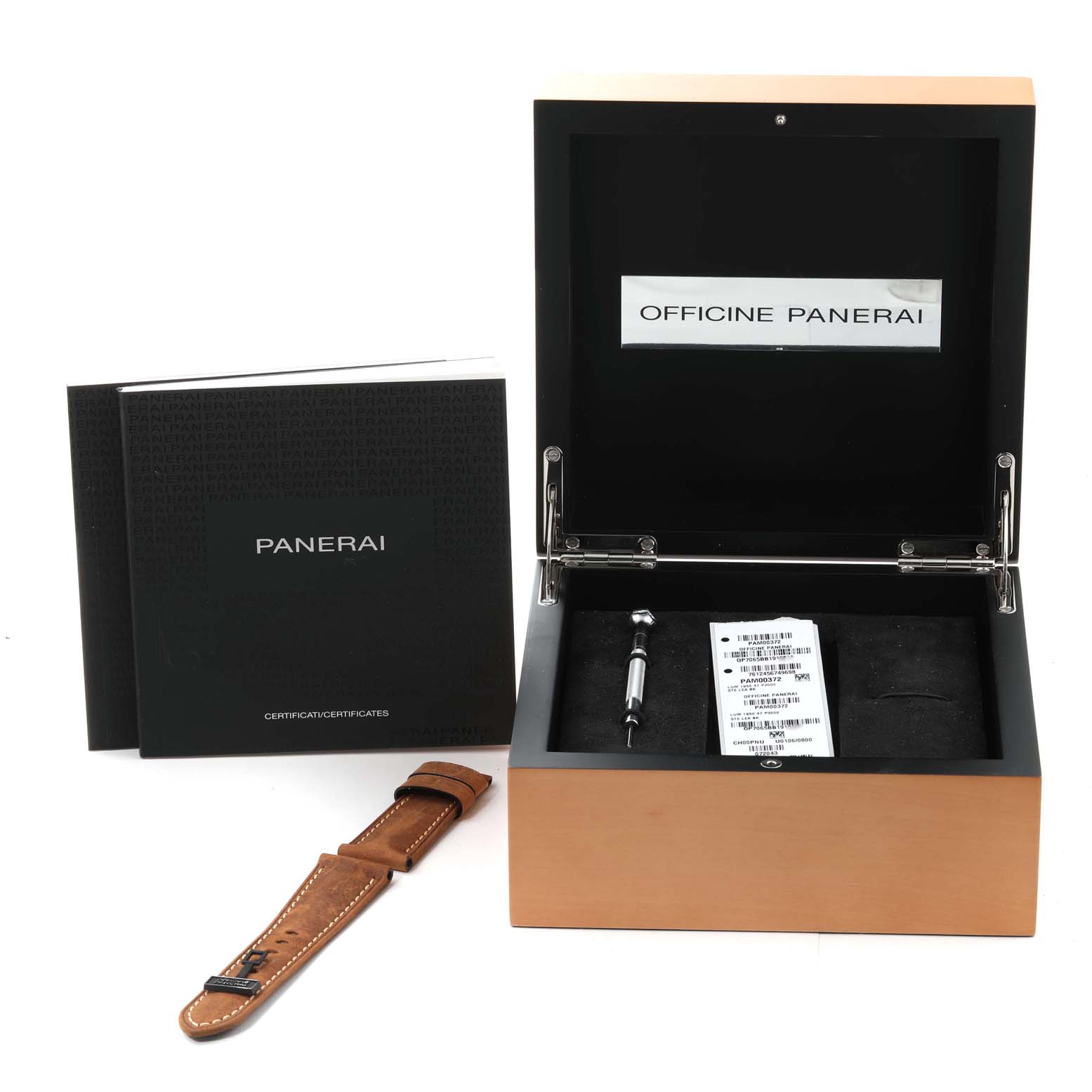 This image shows the packaging, warranty booklet, additional strap, and tools for a Panerai Luminor PAM00372 Men's Stainless Steel Black Dial PAM00372 Men's Stainless Steel Black Dial watch.