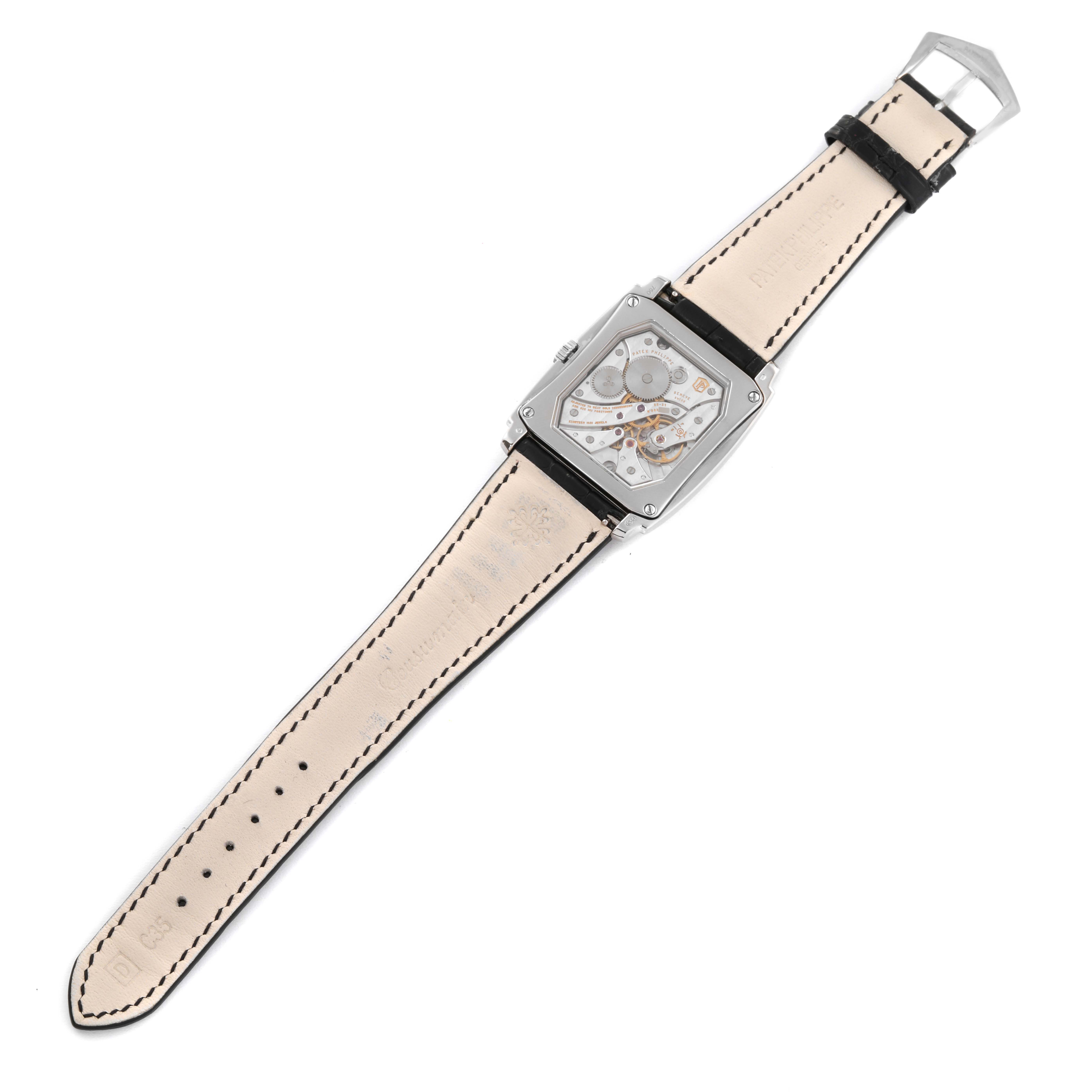 This image shows the back view of the Patek Philippe Gondolo 5124G-011 Men's White Gold Blue Dial 5124G-011 Men's White Gold Blue Dial watch, highlighting the movement and inner mechanisms.