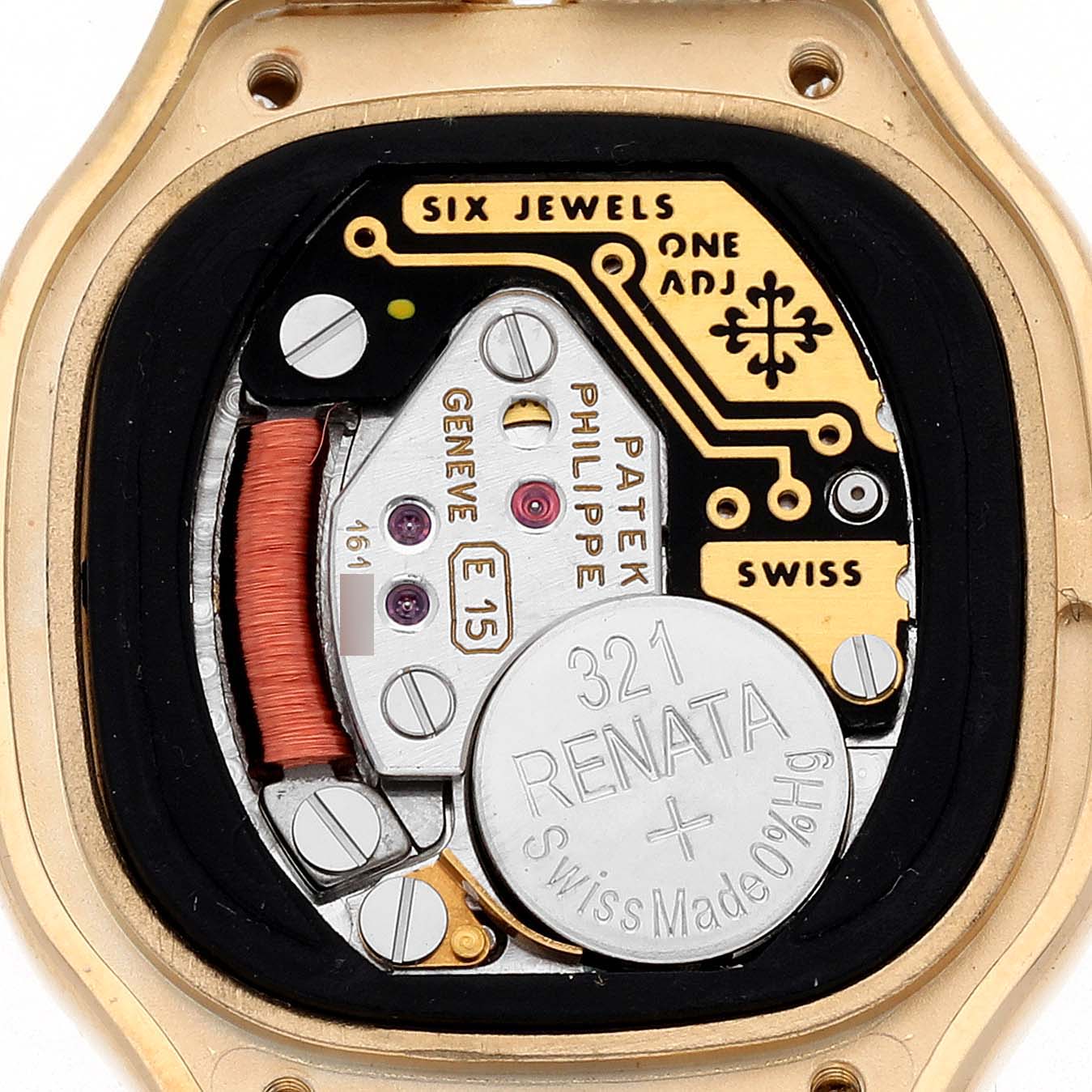 The image shows the inner workings of the Patek Philippe La Flamme  4815/003 Women's Yellow Gold Silver Dial 4815/003 Women's Yellow Gold Silver Dialwatch, highlighting its movement and battery components.