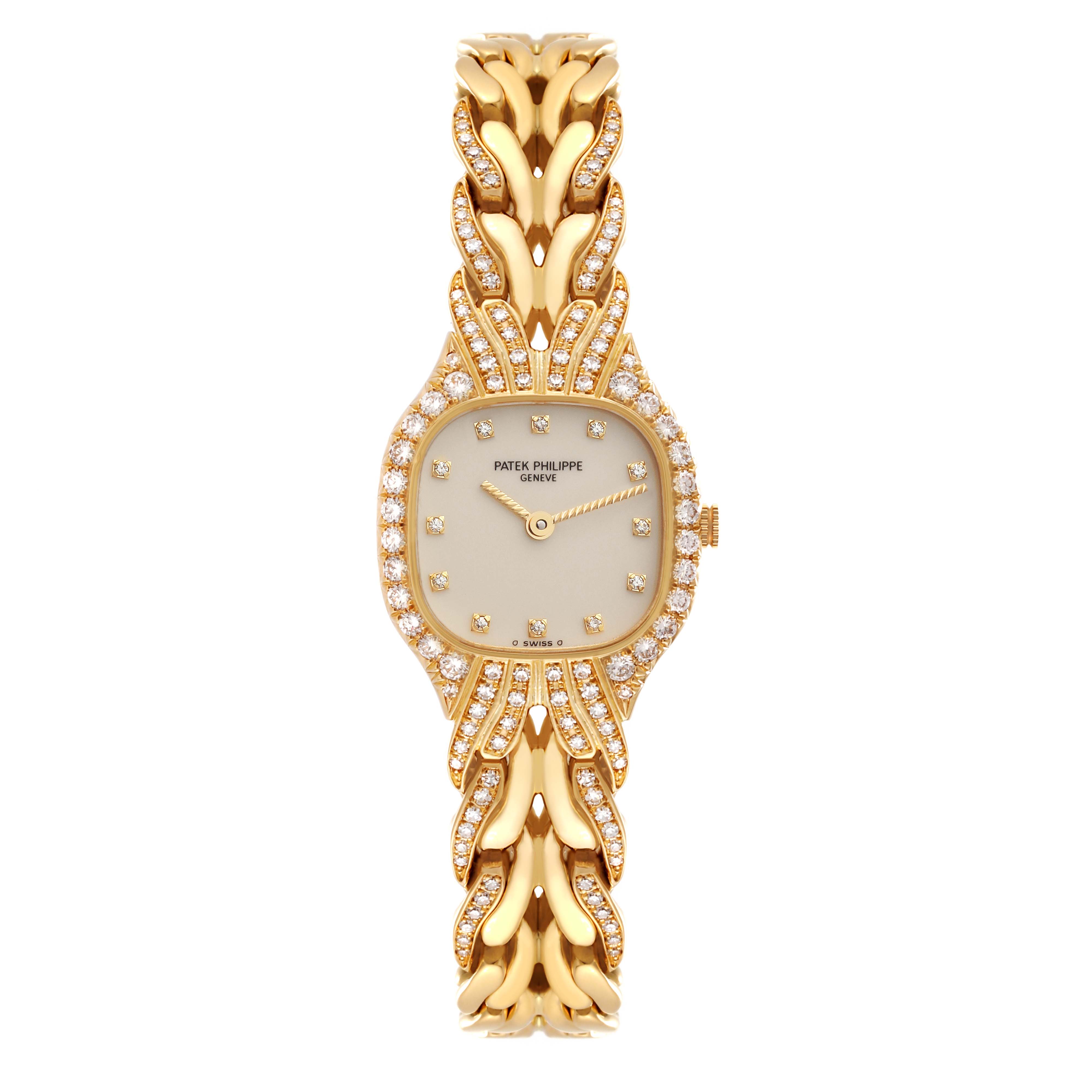 The Patek Philippe La Flamme  4815/003 Women's Yellow Gold Silver Dial 4815/003 Women's Yellow Gold Silver Dialwatch is shown from a top-down angle, displaying its face and intricate bracelet.