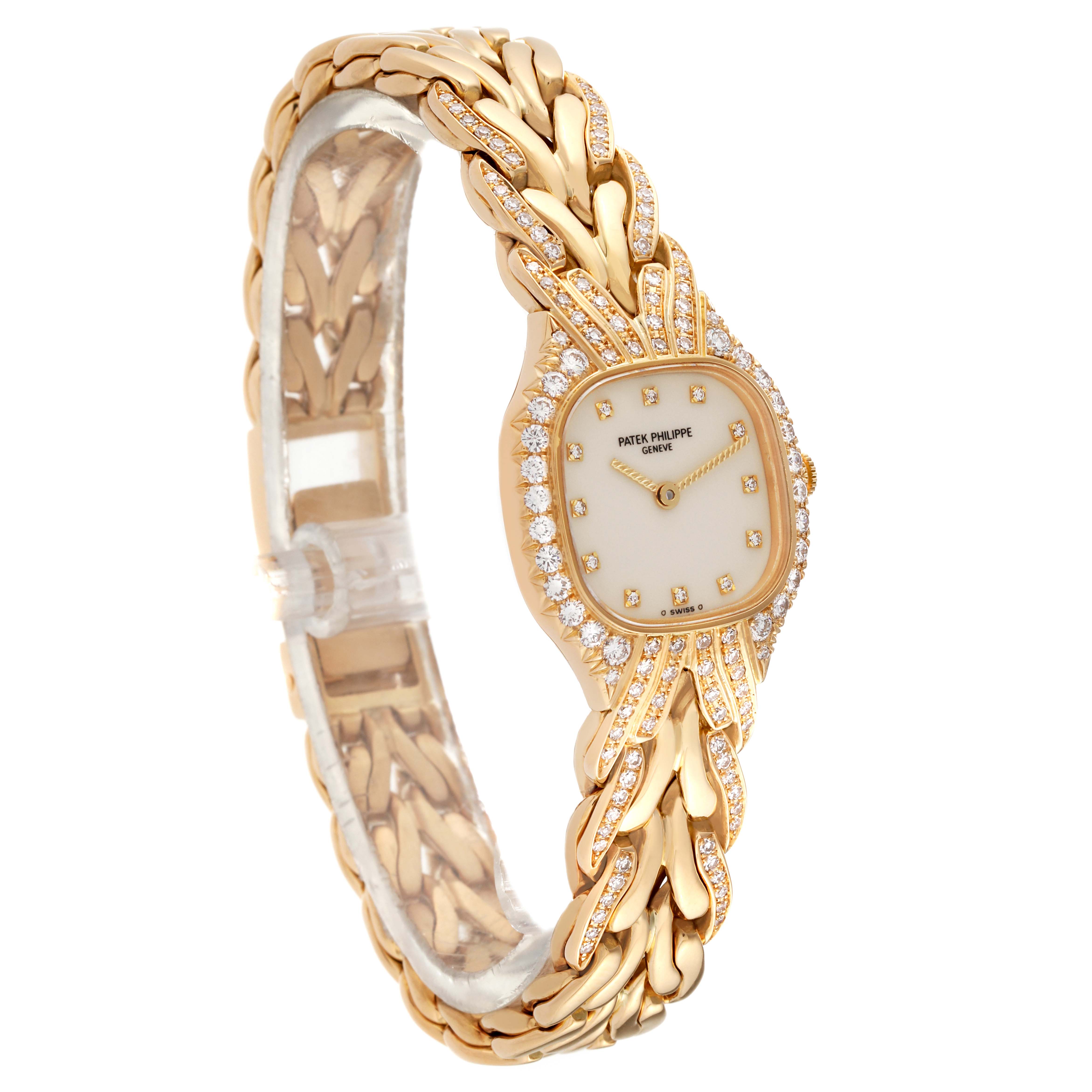 The image shows a Patek Philippe La Flamme  4815/003 Women's Yellow Gold Silver Dial 4815/003 Women's Yellow Gold Silver Dialwatch from an angled side view, highlighting the face, case, and bracelet.