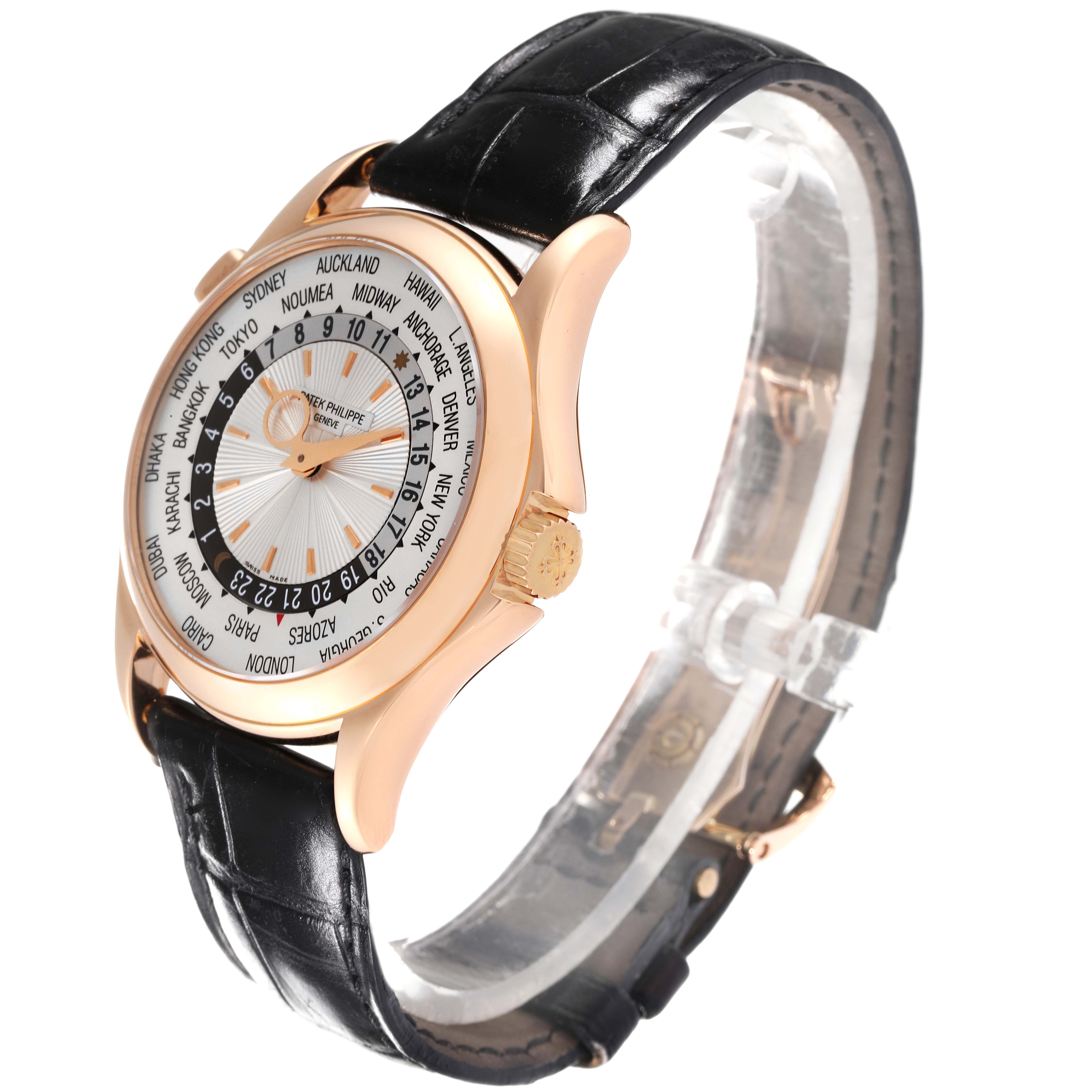 The image shows a Patek Philippe Complications 5130R-001 Men's Rose Gold Silver Dial 5130R-001 Men's Rose Gold Silver Dial watch at an oblique angle, highlighting its dial, case, and strap.