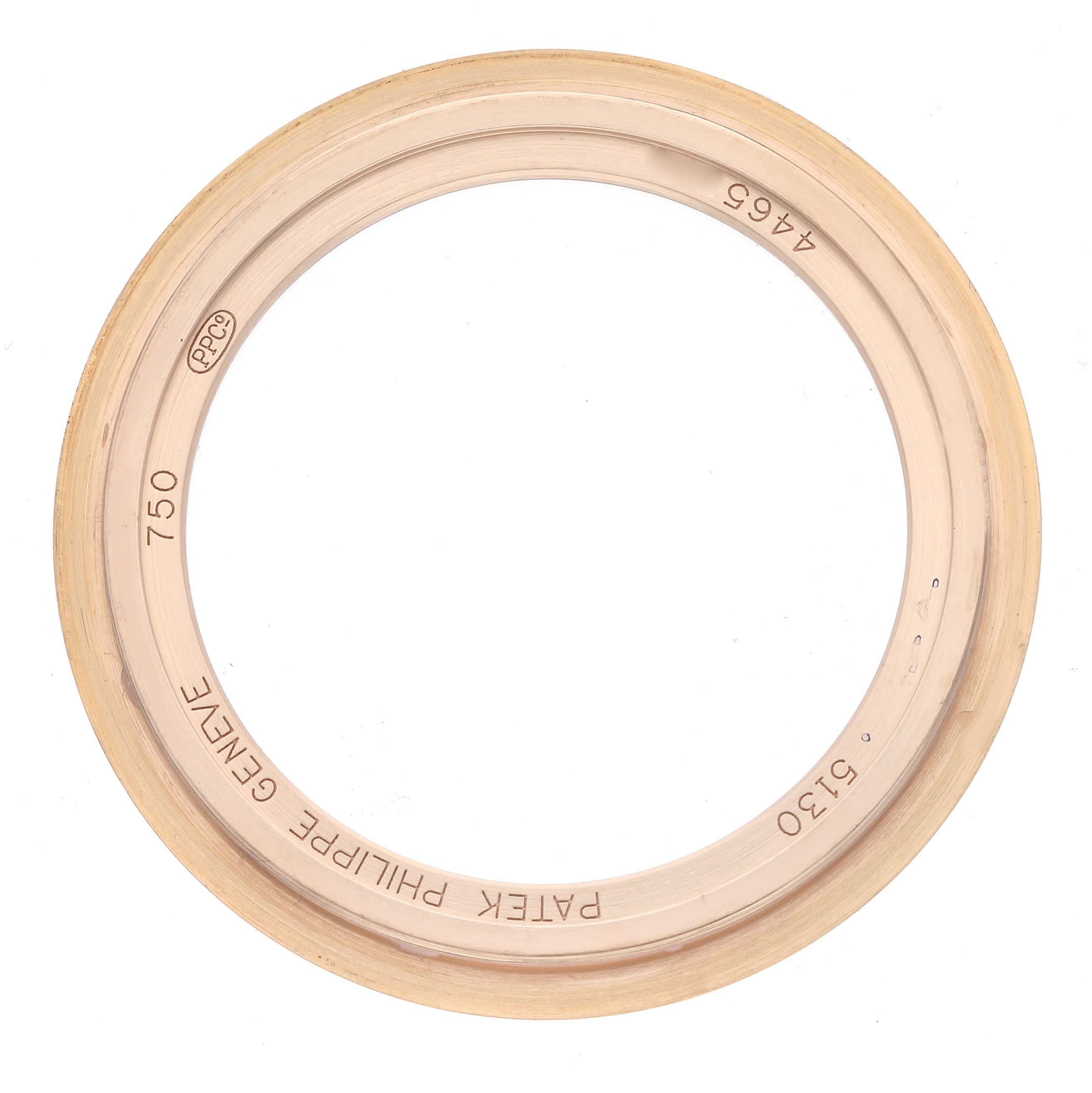 This image shows a Patek Philippe Complications 5130R-001 Men's Rose Gold Silver Dial 5130R-001 Men's Rose Gold Silver Dial model watch bezel viewed from above.