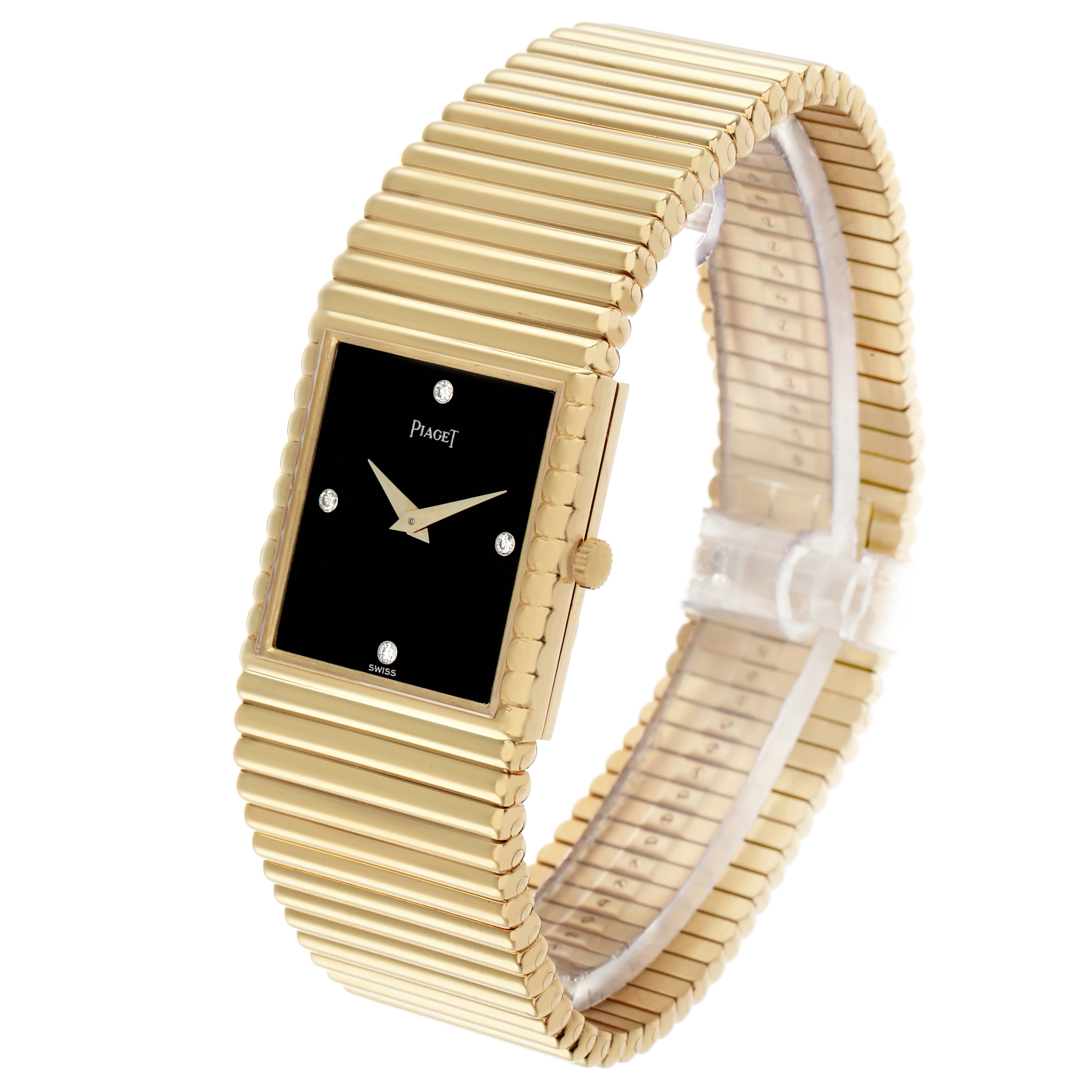 The Piaget 91490C510 Women
s Yellow Gold Black Dial Emperador 91490C510 watch is shown at an angle highlighting its yellow gold, diamond-accented black dial and bracelet.