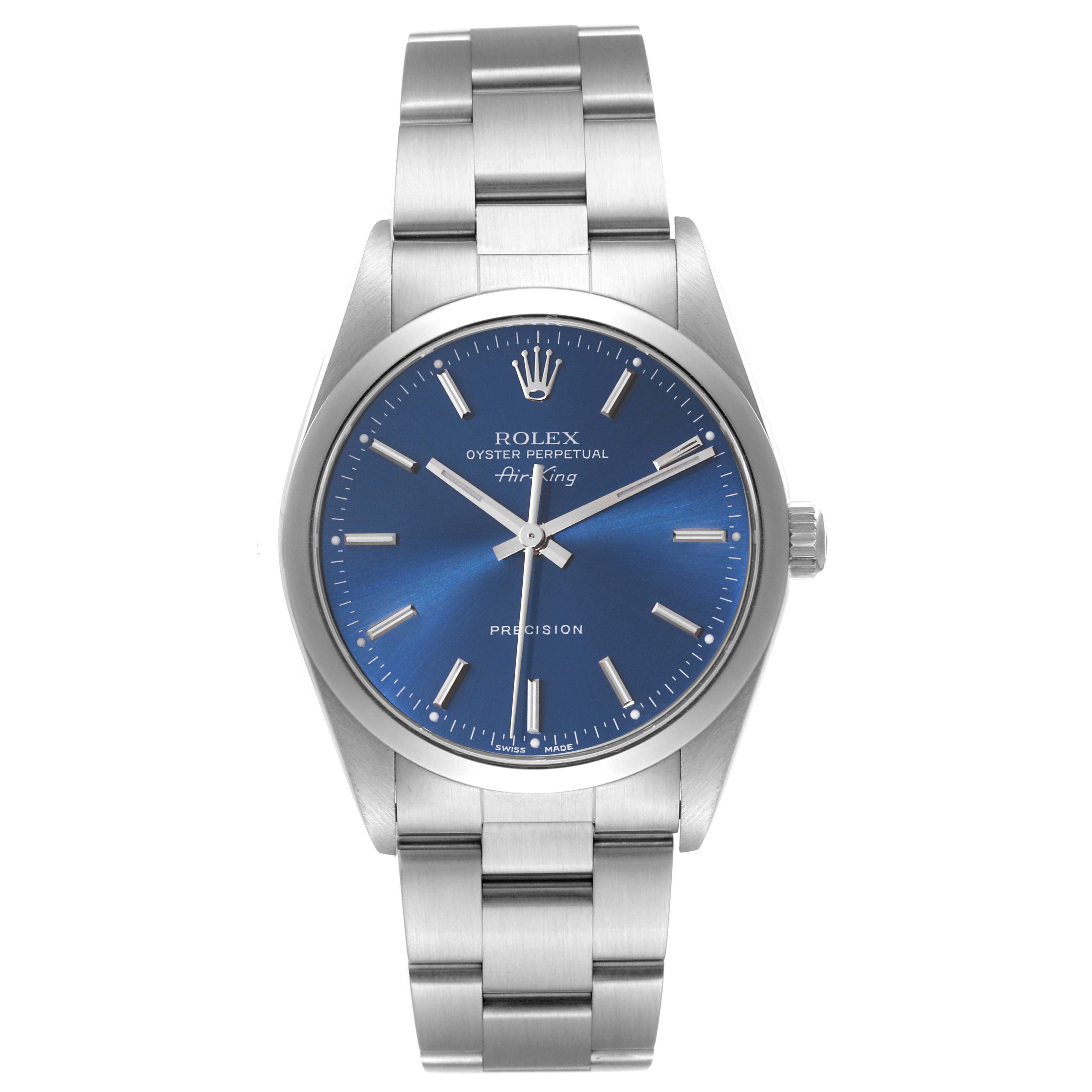 This Rolex Air-King 14000M Men's Stainless Steel Blue Dial 14000M Men's Stainless Steel Blue Dial watch is shown from the front, displaying its blue dial, silver-tone hands, hour markers, and stainless steel bracelet.