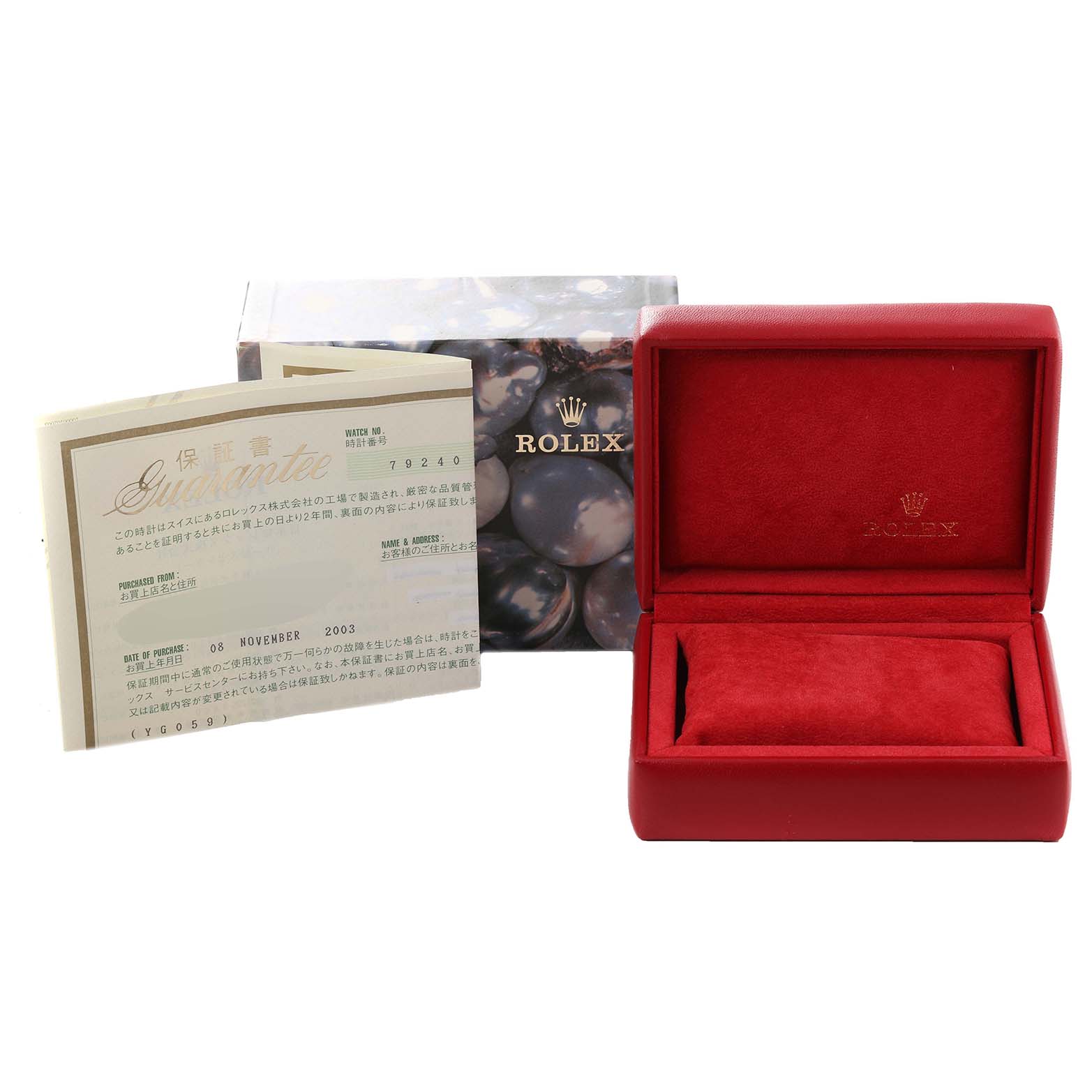This image shows the box and paperwork for a Rolex Date 79240 Women
s Stainless Steel Silver Dial 79240 Women
s Stainless Steel Silver Dial model watch, including a red watch box and warranty card.