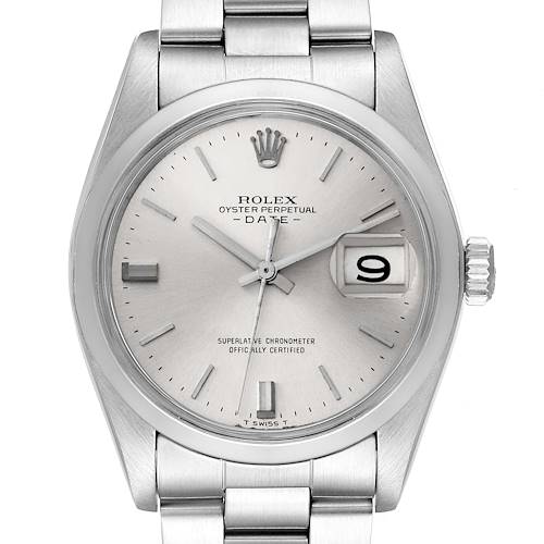 The image shows a front view of the Rolex Vintage Collection model, displaying the dial, hour markers, crown, and part of the bracelet.