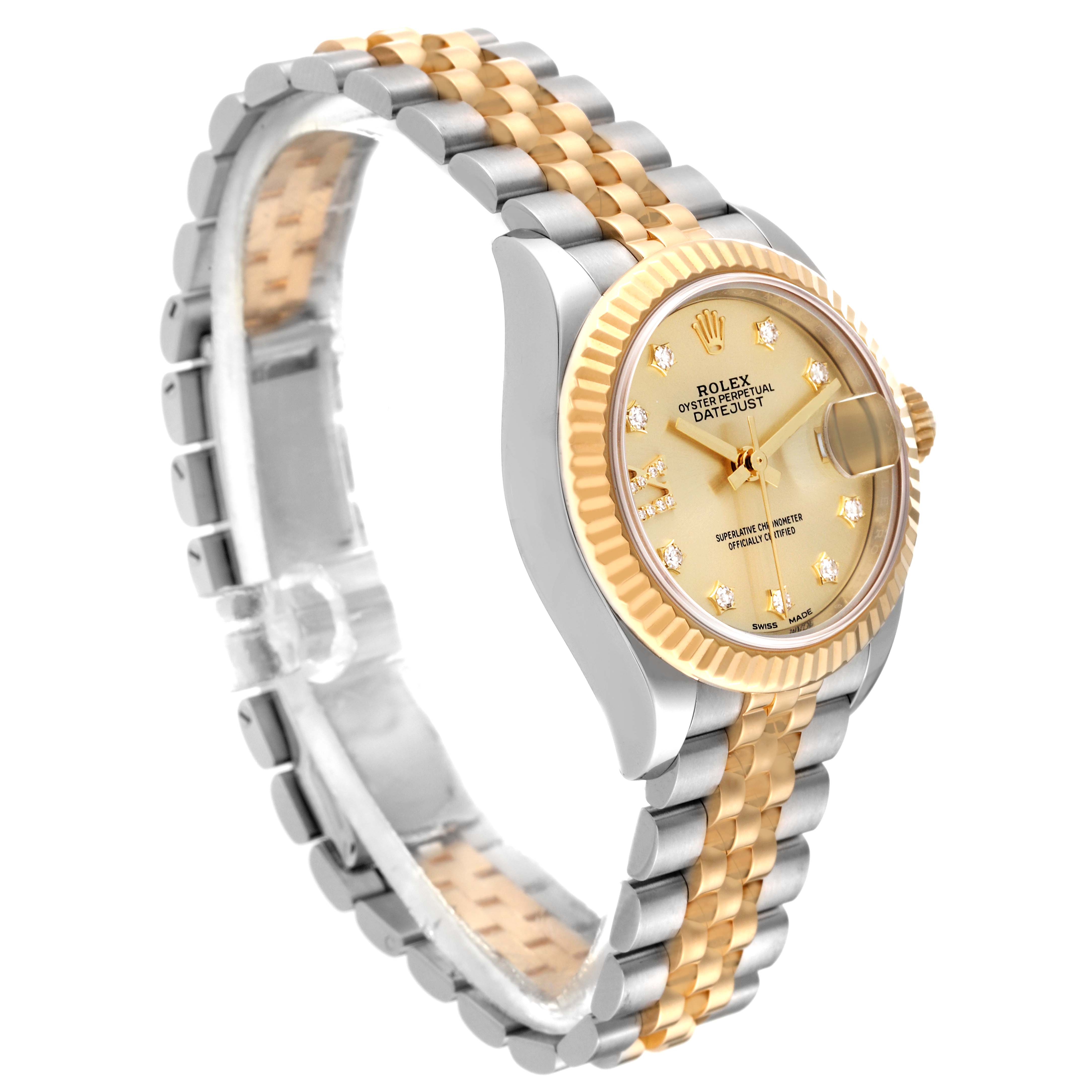 This image shows a side angle of the Rolex Datejust 279173 Women's Steel and Gold (two tone) Champagne Dial 279173 Women's Steel and Gold (two tone) Champagne Dial watch, highlighting its two-tone bracelet, fluted bezel, and dial.