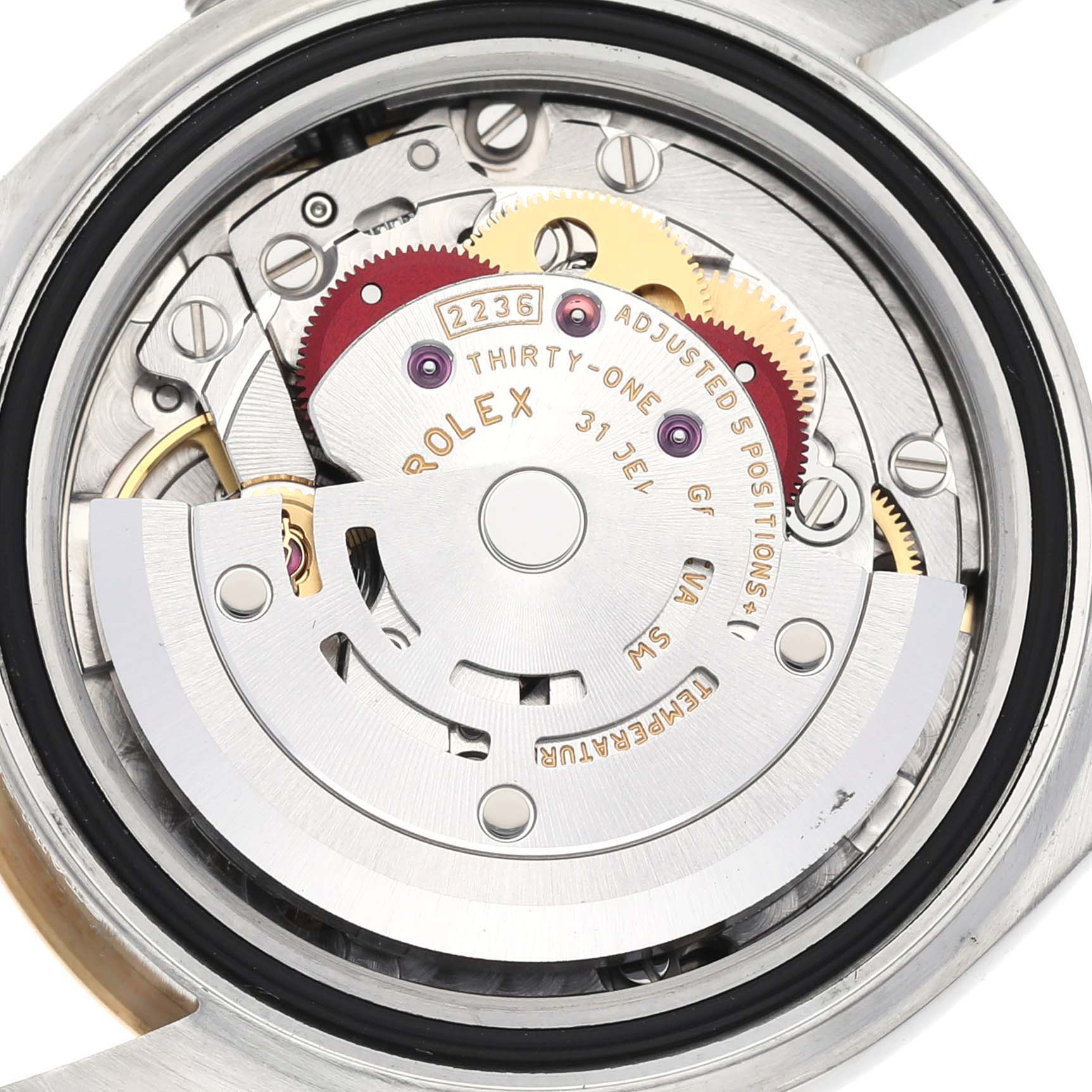 The image shows a close-up of the internal mechanism of a Rolex Datejust 279173 Women's Steel and Gold (two tone) Champagne Dial 279173 Women's Steel and Gold (two tone) Champagne Dial watch.