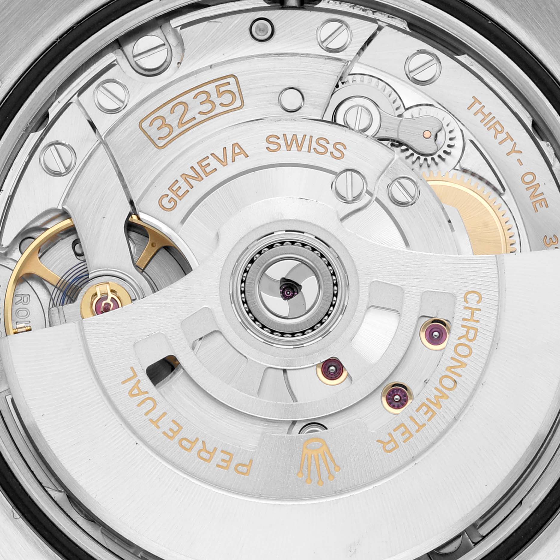 This image shows the movement mechanism of a Rolex Datejust 126231 Men's Steel and Gold (two tone) Grey Dial 126231 Men's Steel and Gold (two tone) Grey Dial watch, highlighting components such as gears and the oscillating weight.