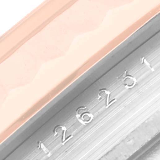 This image shows a close-up angle of the Datejust model by Rolex, focusing on the serial number engraving.