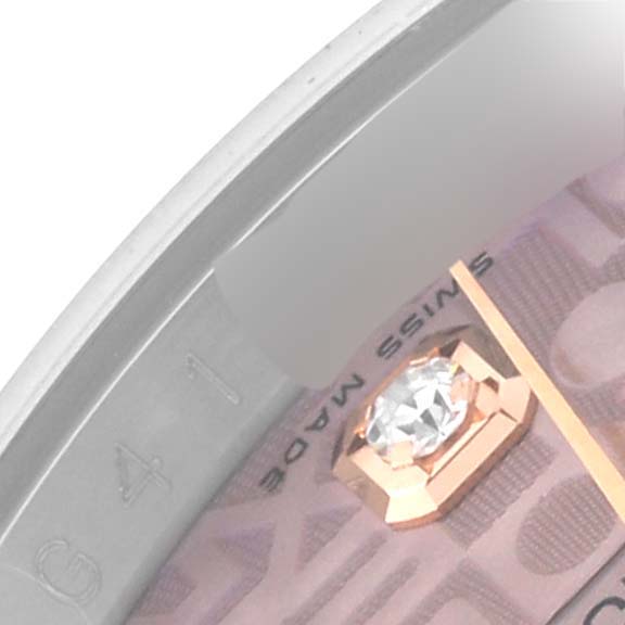 The image shows a close-up of a Rolex Datejust 116231 Men's Steel and Gold (two tone) Pink Dial 116231 Men's Steel and Gold (two tone) Pink Dial watch dial, highlighting a diamond marker and portions of the branding.