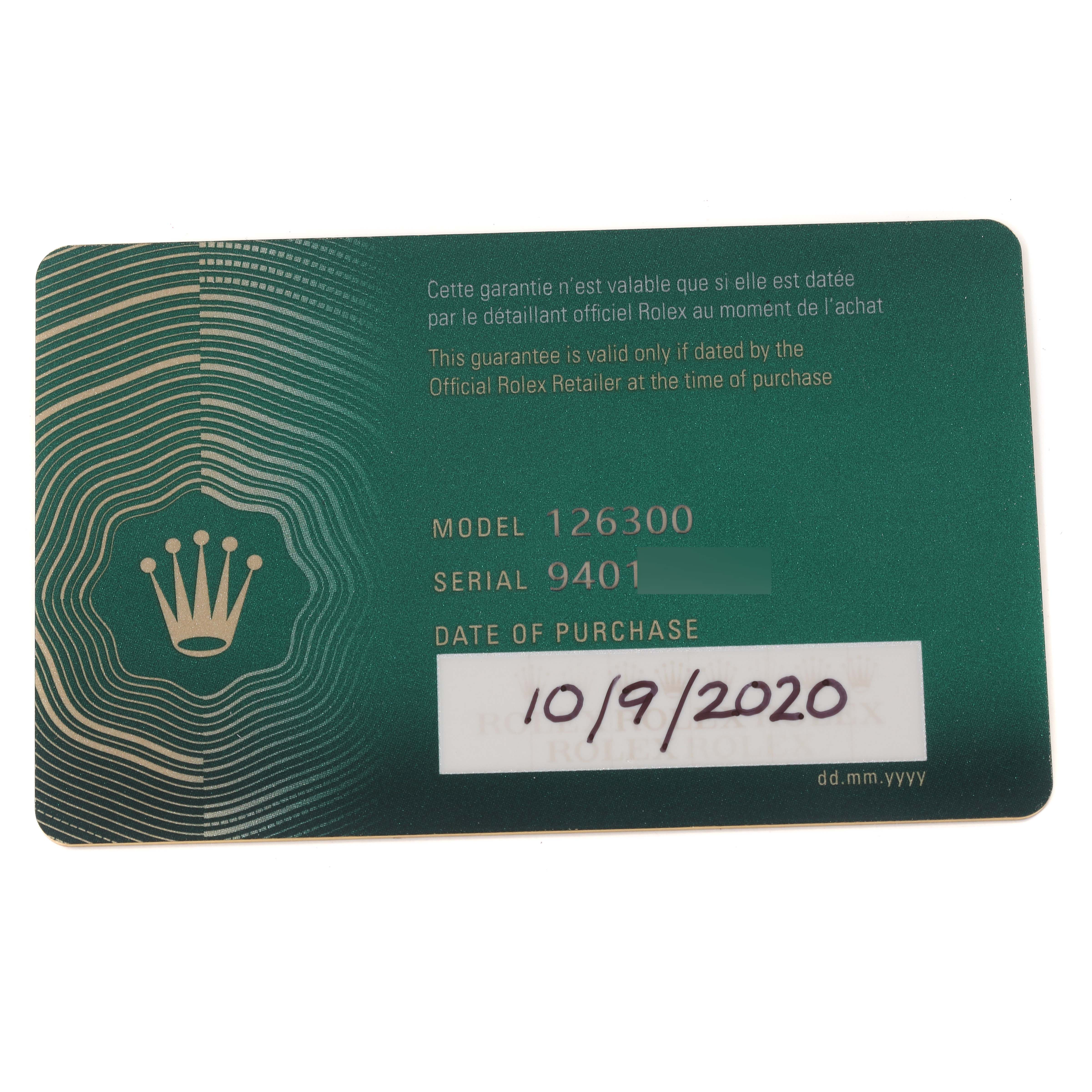 This image shows the warranty card for the Rolex Datejust 41 126300 Men
s Stainless Steel Grey Dial 126300 Men
s Stainless Steel Grey Dial model 126300, including the date of purchase and serial number.