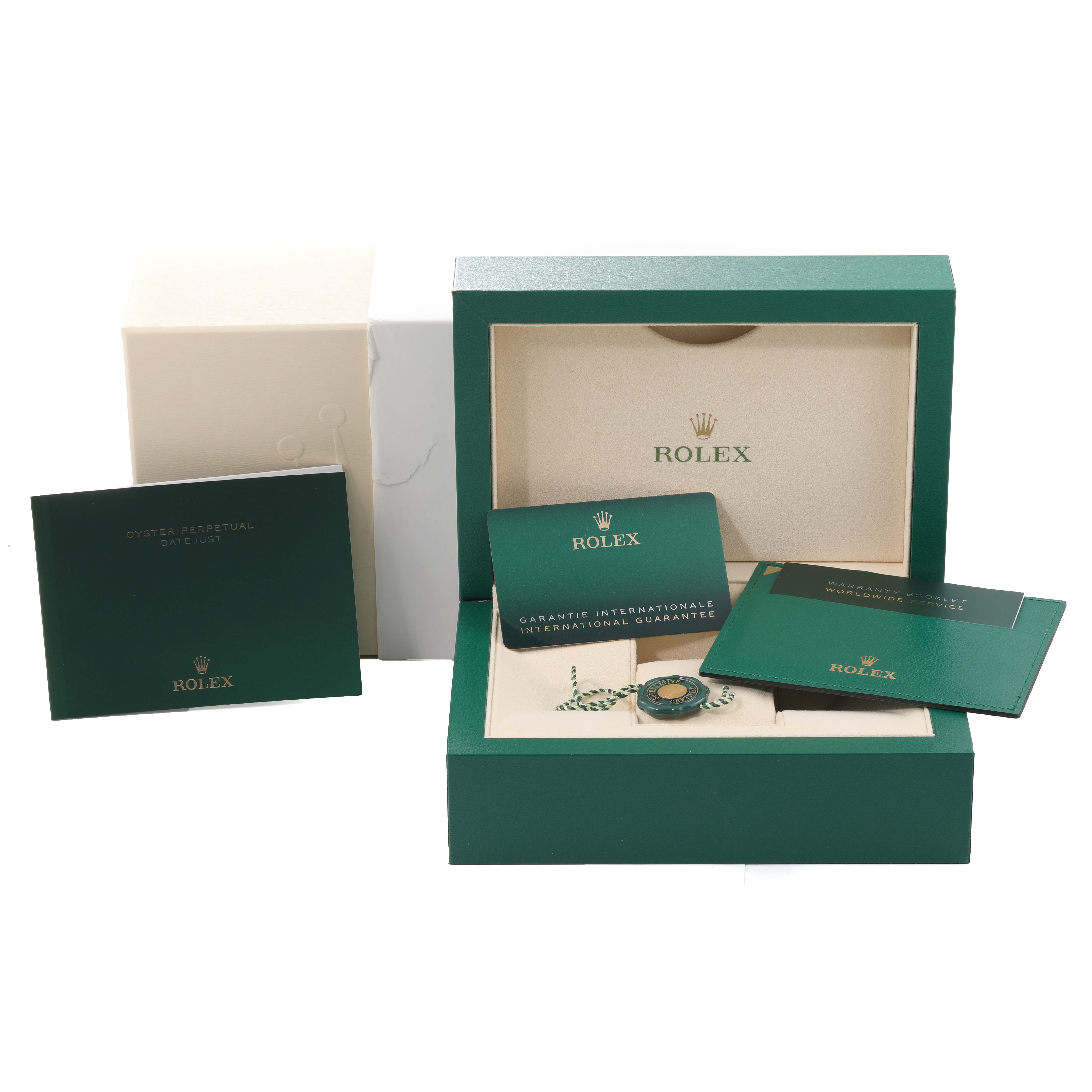 The image shows the packaging and accessories of a Rolex Datejust 41 126300 Men
s Stainless Steel Grey Dial 126300 Men
s Stainless Steel Grey Dial, including its box, manuals, and guarantee.