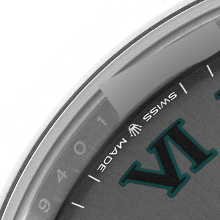The image shows a close-up of the dial and a small portion of the bezel of the Rolex Datejust 41 126300 Men
s Stainless Steel Grey Dial 126300 Men
s Stainless Steel Grey Dial watch, highlighting the "SWISS MADE" text and part of the VI hour marker.