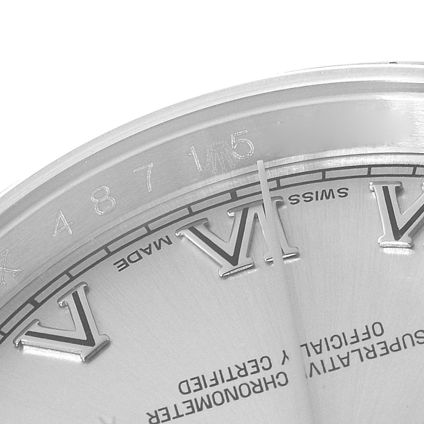 This image shows a close-up of the dial, including Roman numerals and inscriptions, of a Rolex Datejust 116200 Men's Stainless Steel Silver Dial 116200 Men's Stainless Steel Silver Dial watch.