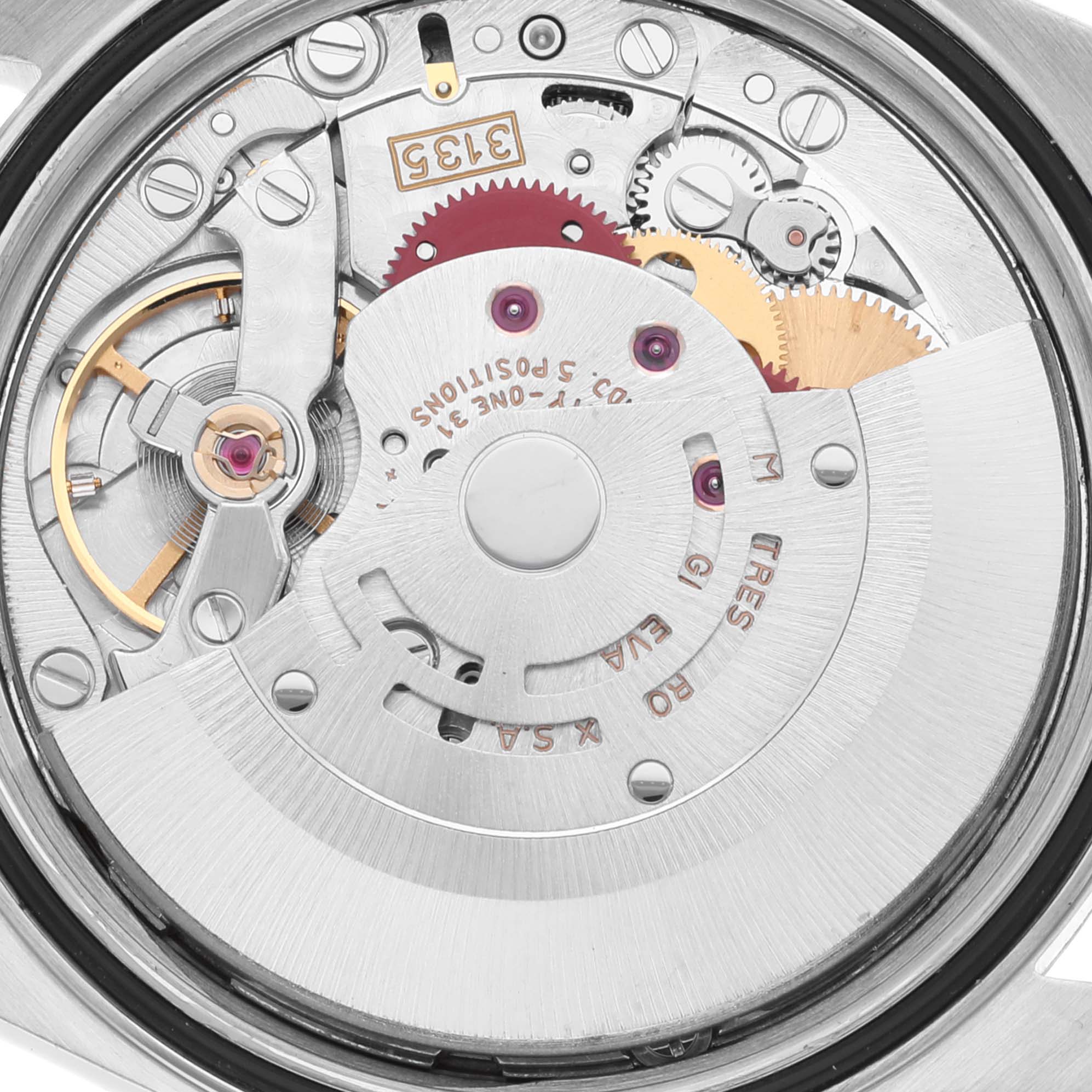 This image shows a close-up of the movement mechanism of a Rolex Datejust 16233 Men's Steel and Gold (two tone) Champagne Dial 16233 Men's Steel and Gold (two tone) Champagne Dial watch.