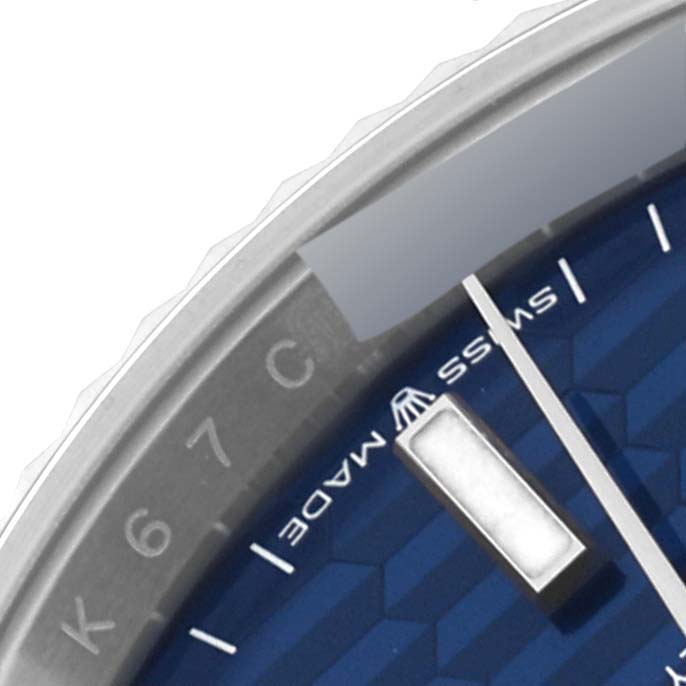 The image shows a close-up of the dial and bezel of a Rolex Datejust 126234 Men's Stainless Steel Blue Dial 126234 Men's Stainless Steel Blue Dial watch, highlighting the "Swiss Made" text.