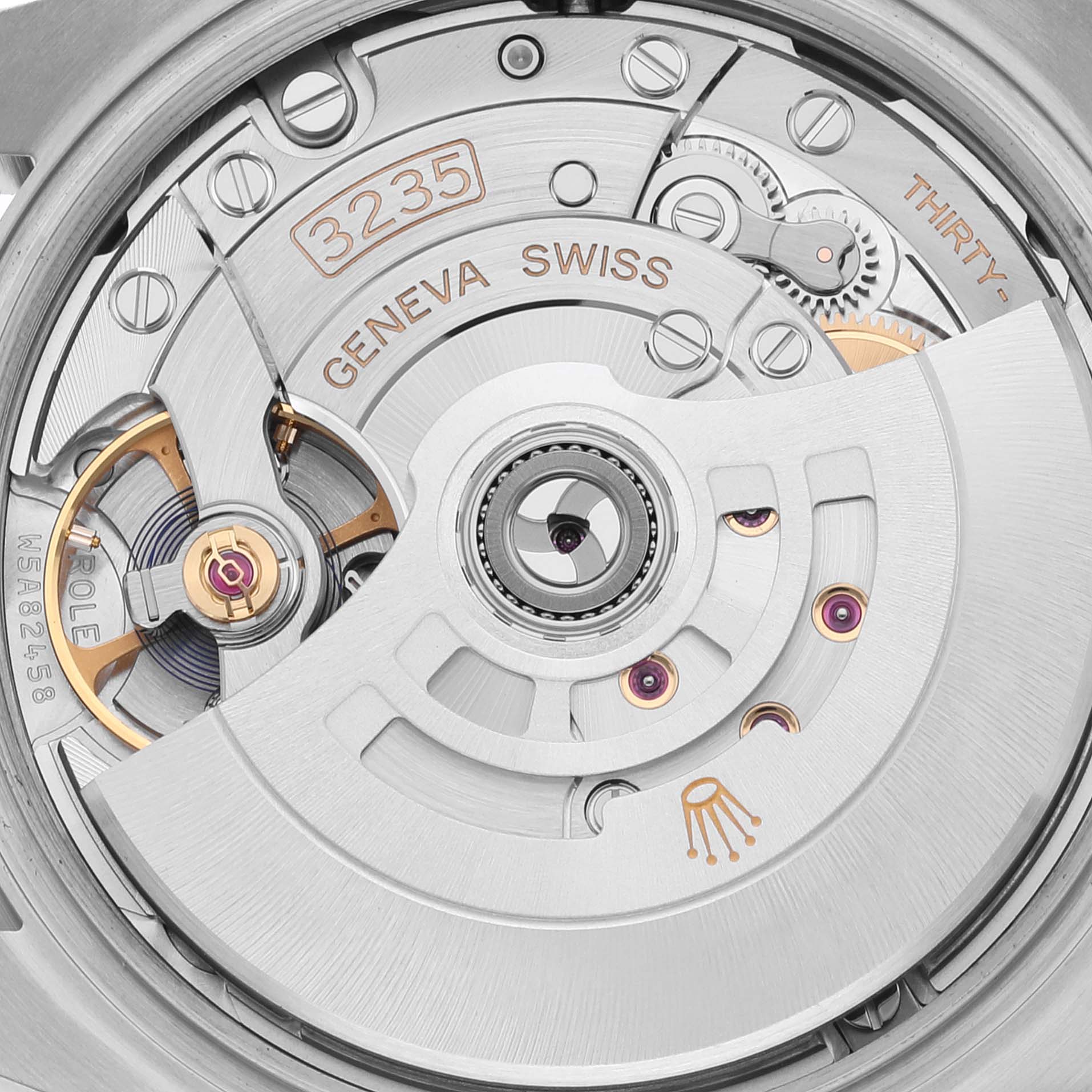 The image shows a close-up view of the movement mechanism of a Rolex Datejust 126234 Men's Stainless Steel Blue Dial 126234 Men's Stainless Steel Blue Dial watch, featuring the caliber 3235.