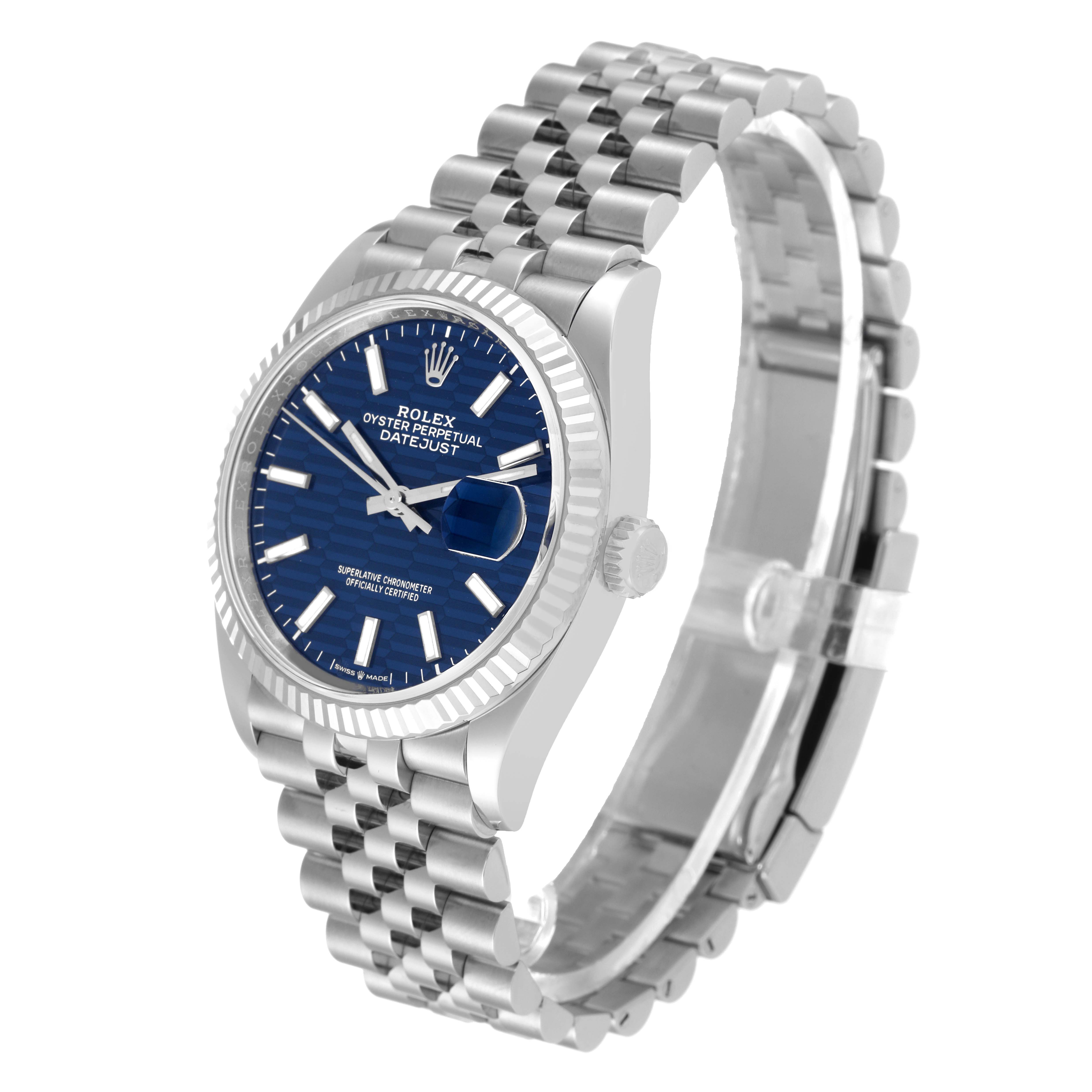 The image shows a side angle of a Rolex Datejust 126234 Men's Stainless Steel Blue Dial 126234 Men's Stainless Steel Blue Dial watch, highlighting its blue dial, fluted bezel, and jubilee bracelet.