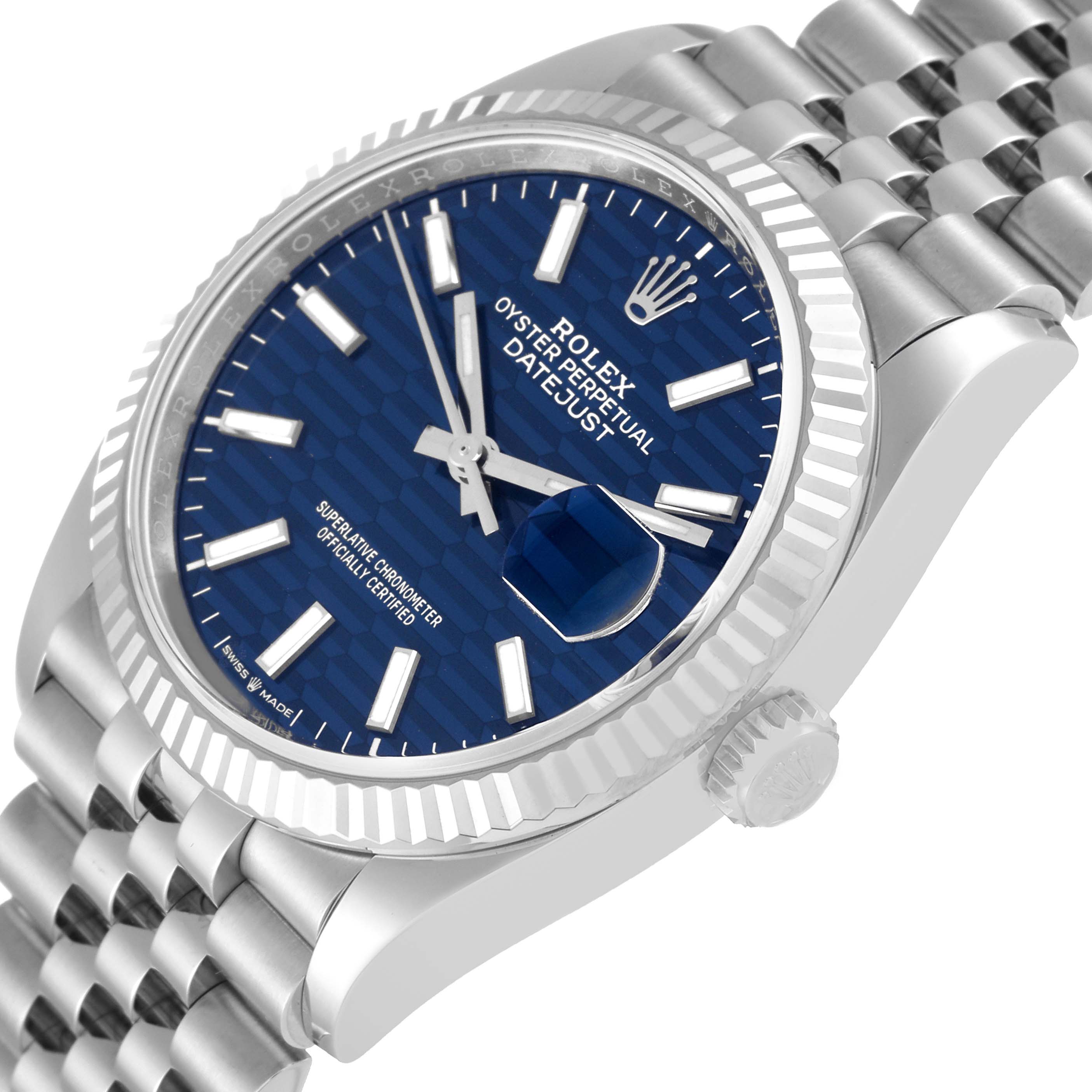 The image shows a close-up angled view of the Rolex Datejust 126234 Men's Stainless Steel Blue Dial 126234 Men's Stainless Steel Blue Dial watch, displaying its face, bezel, crown, and part of the bracelet.