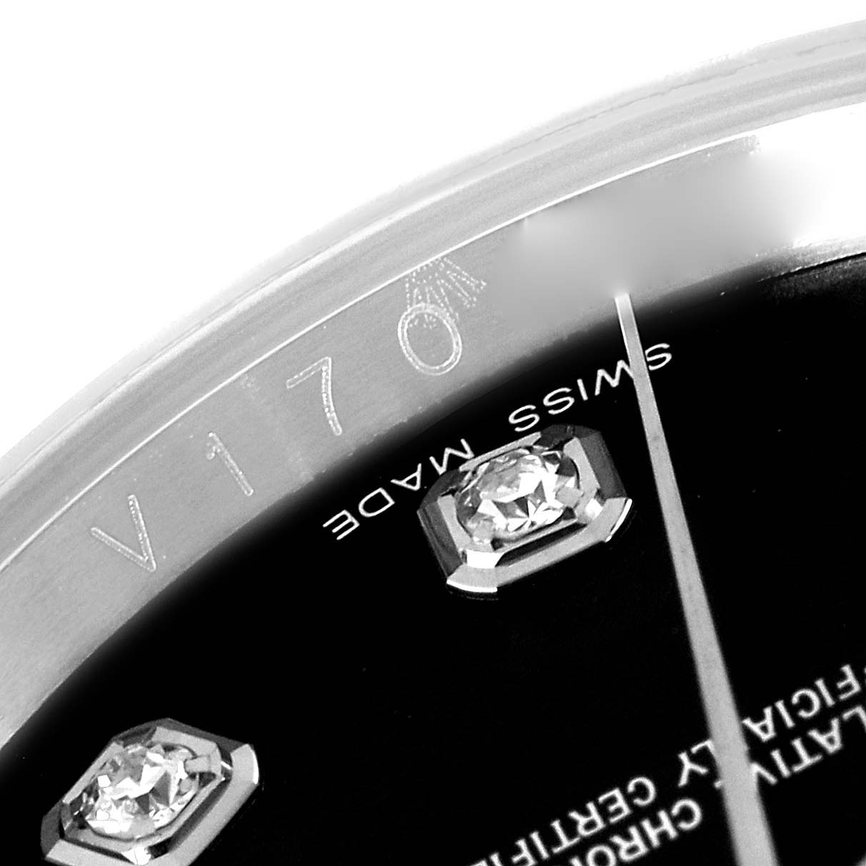The image shows a close-up of the dial and bezel of a Rolex Datejust 116234 Men's Stainless Steel Black Dial 116234 Men's Stainless Steel Black Dial watch, highlighting the diamond hour marker and the engraved "Swiss Made".