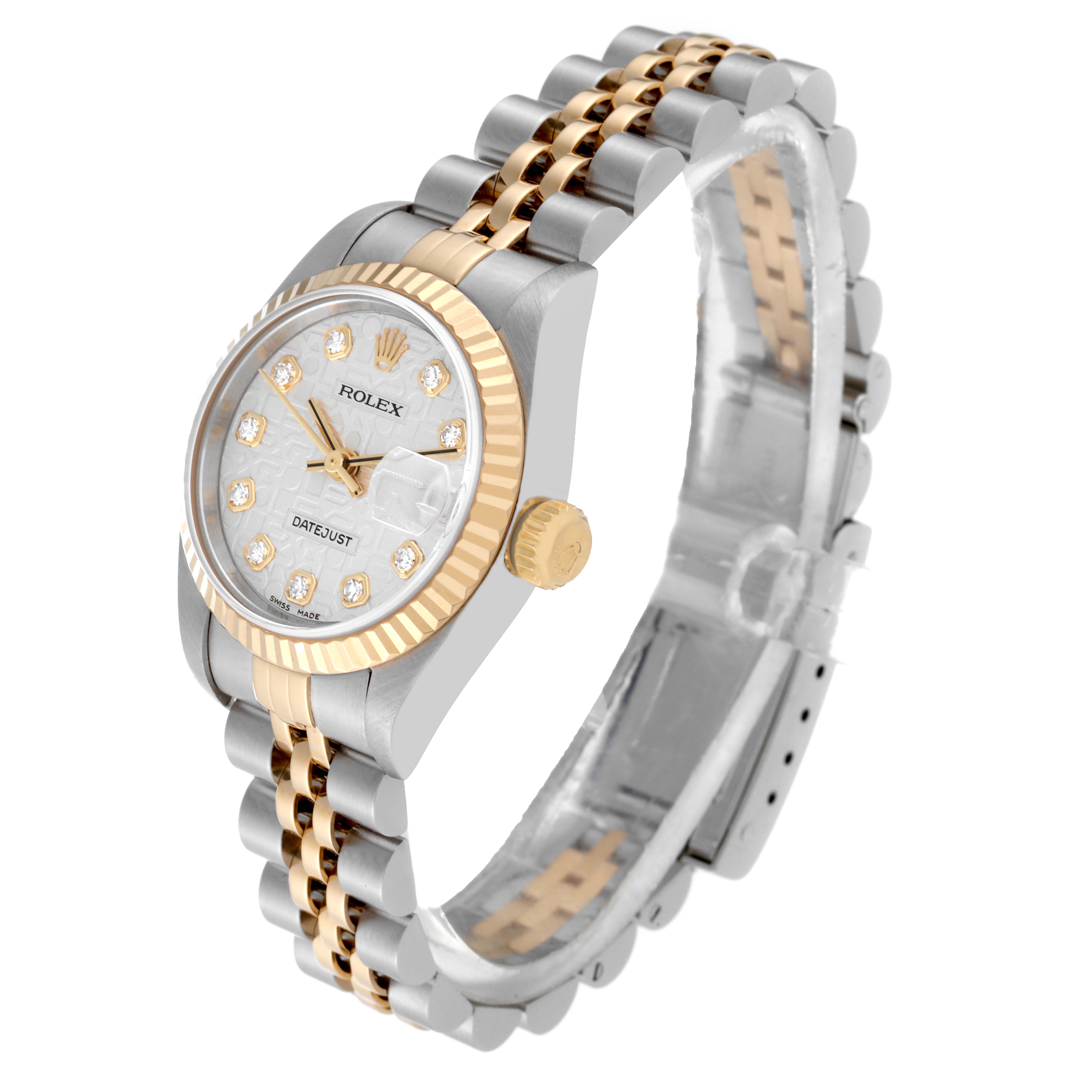 This is a Rolex Datejust 79173 Women's Steel and Gold (two tone) Silver Dial 79173 Women's Steel and Gold (two tone) Silver Dial watch showing a side angle with the face, bezel, crown, and a two-tone bracelet.