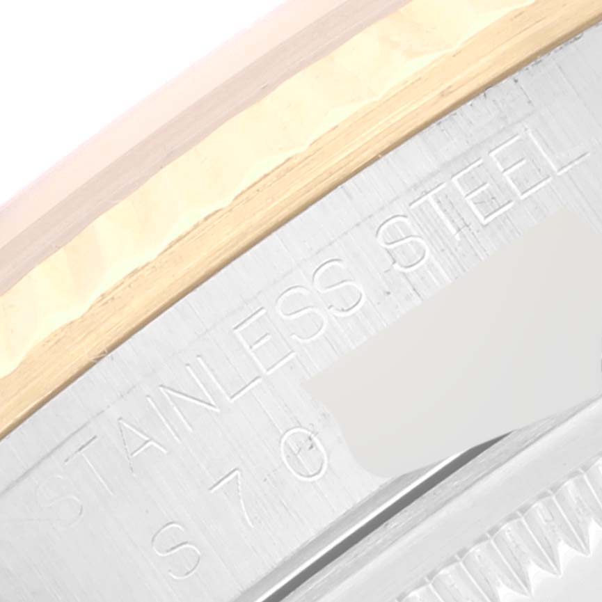 The image shows a close-up of the stainless steel and gold case side of a Rolex Datejust 16233 Men's Steel and Gold (two tone) White Dial 16233 Men's Steel and Gold (two tone) White Dial watch.