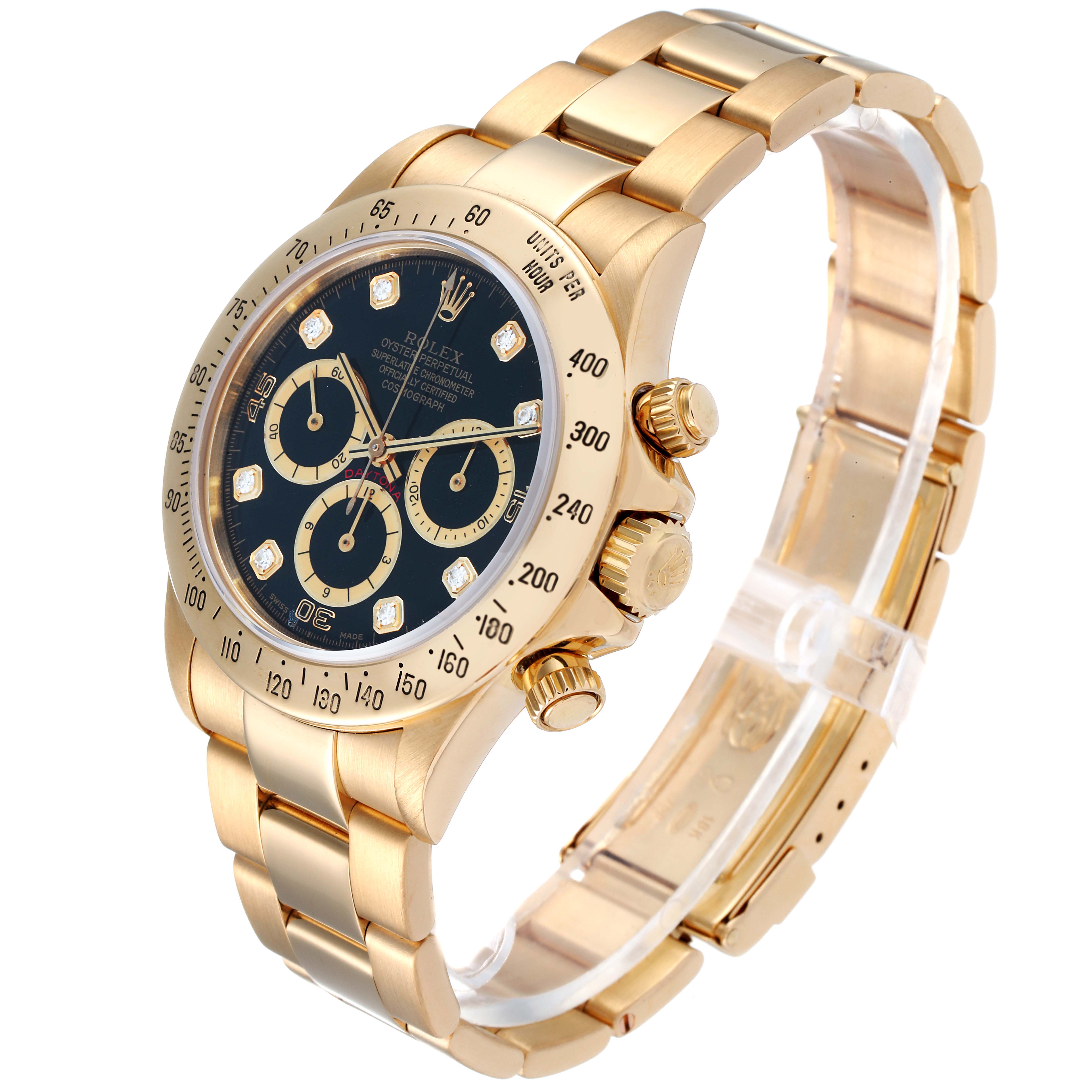 The Rolex Daytona 16528 Men's Yellow Gold Black Dial 16528 Men's Yellow Gold Black Dial watch is shown at a three-quarter angle, displaying its gold band, black dial, and side buttons.