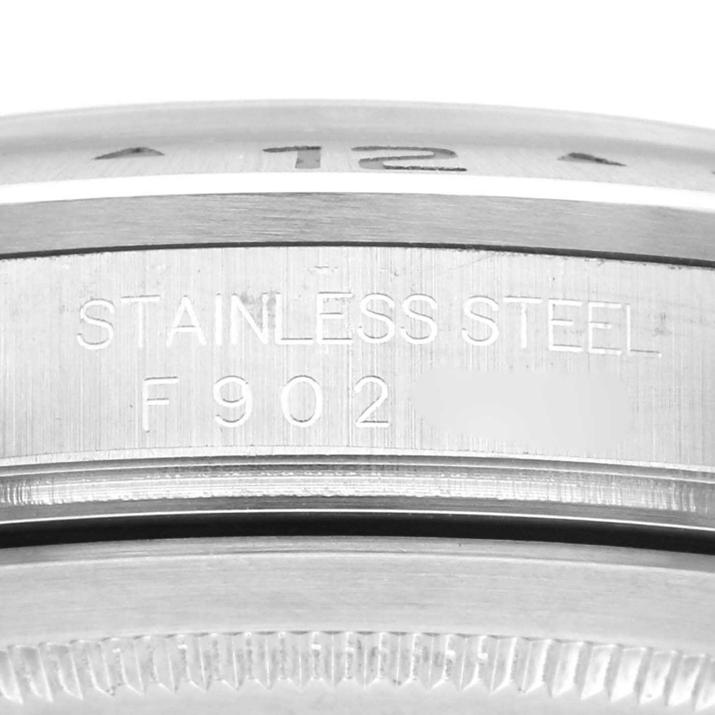 This close-up image shows part of the stainless steel case back with serial engraving on a Rolex Explorer 16570 Men
s Stainless Steel Black Dial 16570 Men
s Stainless Steel Black Dial watch.
