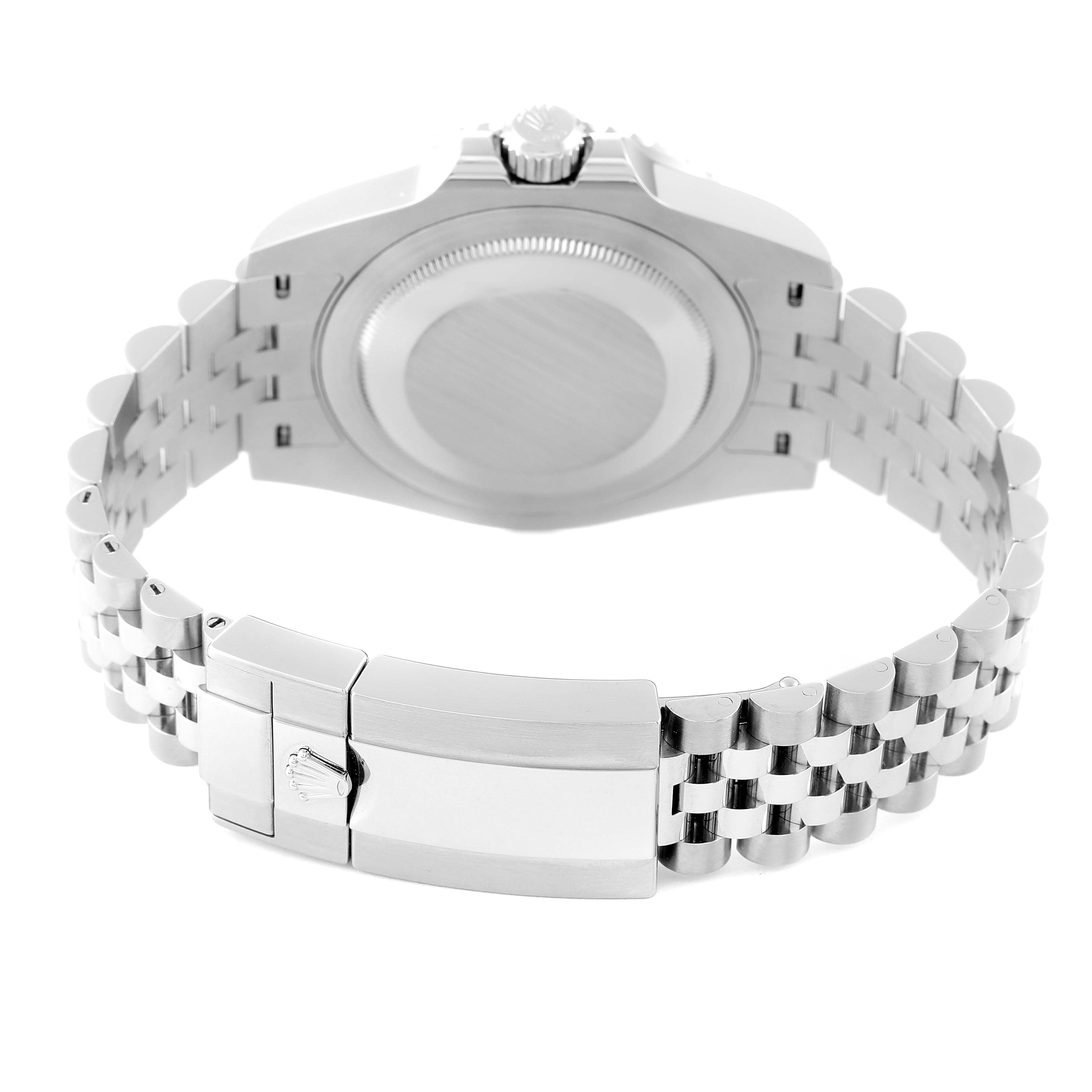 This image shows the back case and fully extended bracelet of a Rolex GMT-Master 126710 Men's Stainless Steel Black Dial 126710 Men's Stainless Steel Black Dial watch.