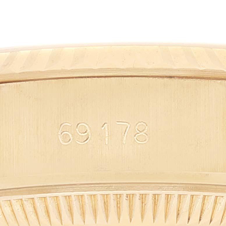 This image shows a close-up of the case side with the model number "69178" engraved on a Rolex President 69178 Women's Yellow Gold Champagne Dial 69178 Women's Yellow Gold Champagne Dial watch.