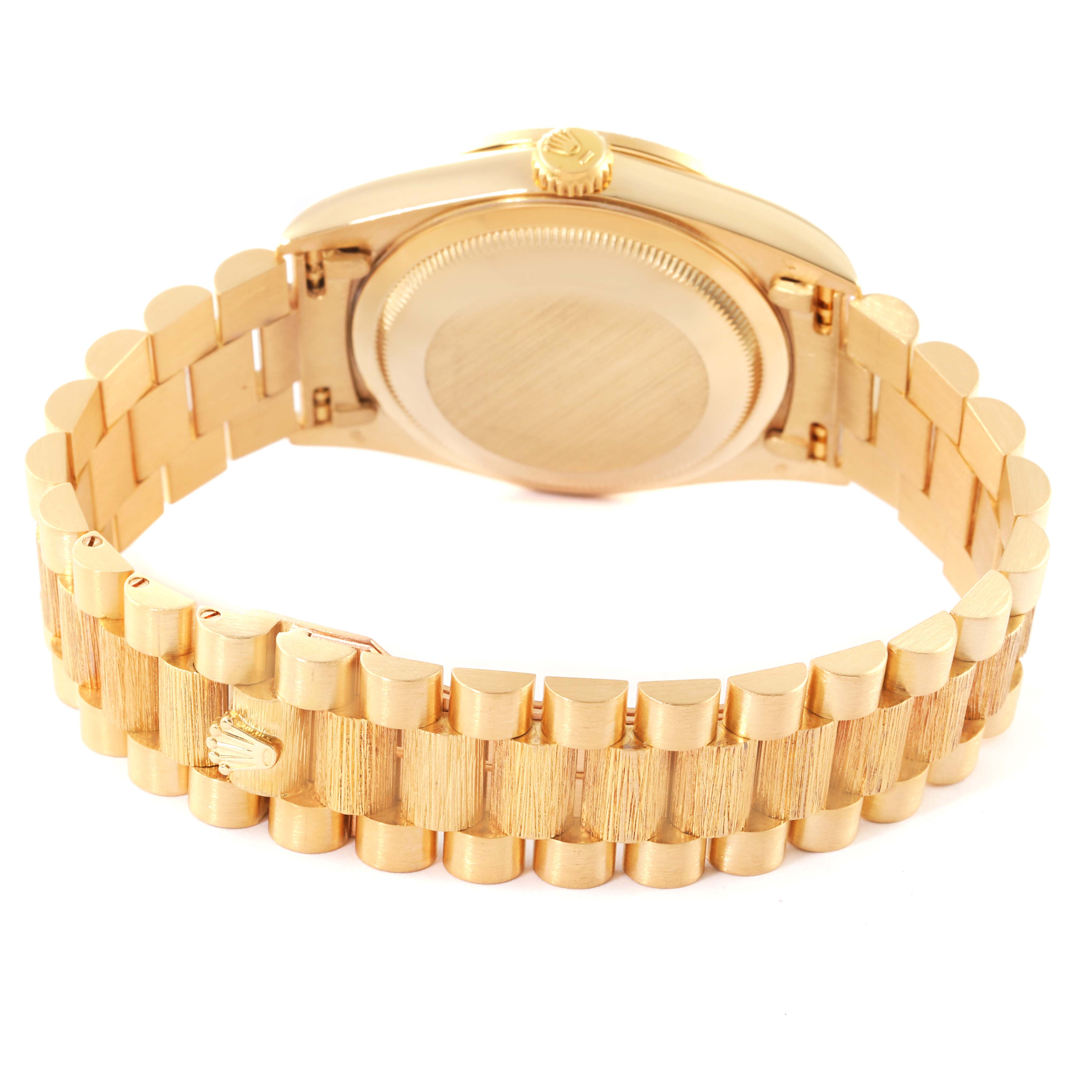 This image shows the back case and bracelet of a Rolex President 18308 Men
s Yellow Gold Champagne Dial 18308 Men
s Yellow Gold Champagne Dial model watch, with the clasp partially visible.