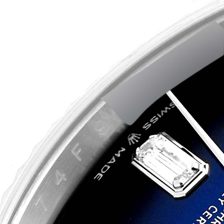 The image shows a partial close-up of the dial and inner bezel of a Rolex President 128239 Men's White Gold Blue Dial 128239 Men's White Gold Blue Dial model watch.