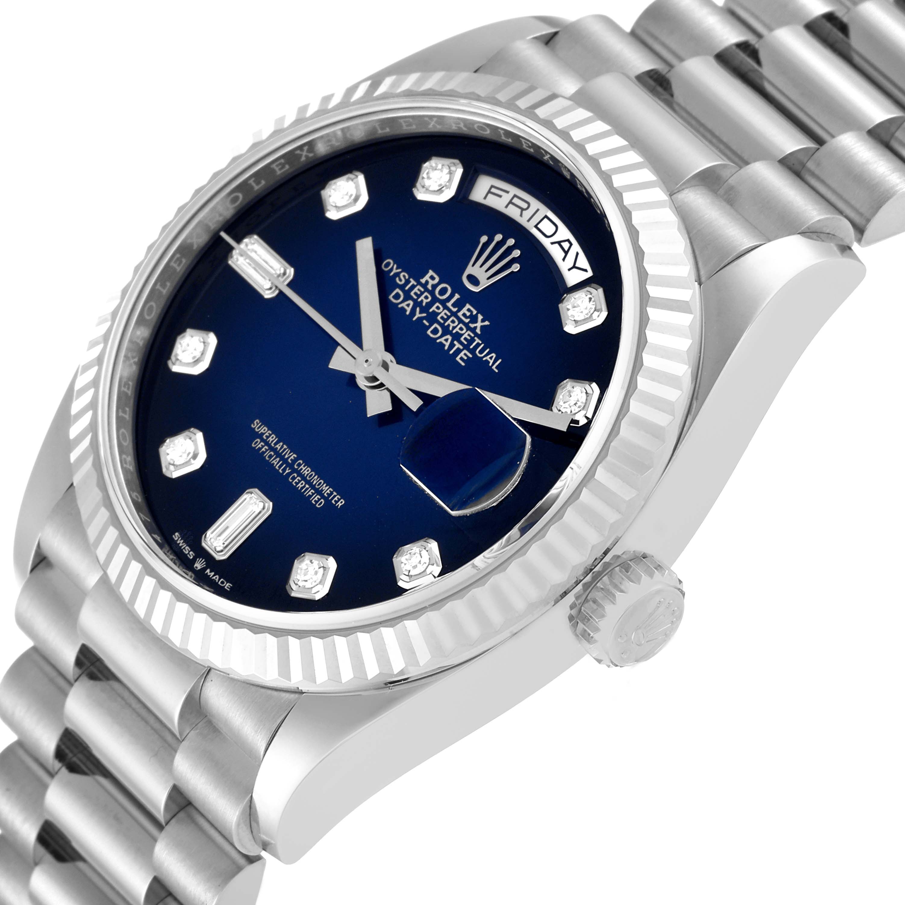 This image shows the face, bezel, and part of the bracelet of a Rolex President 128239 Men's White Gold Blue Dial 128239 Men's White Gold Blue Dial model watch.