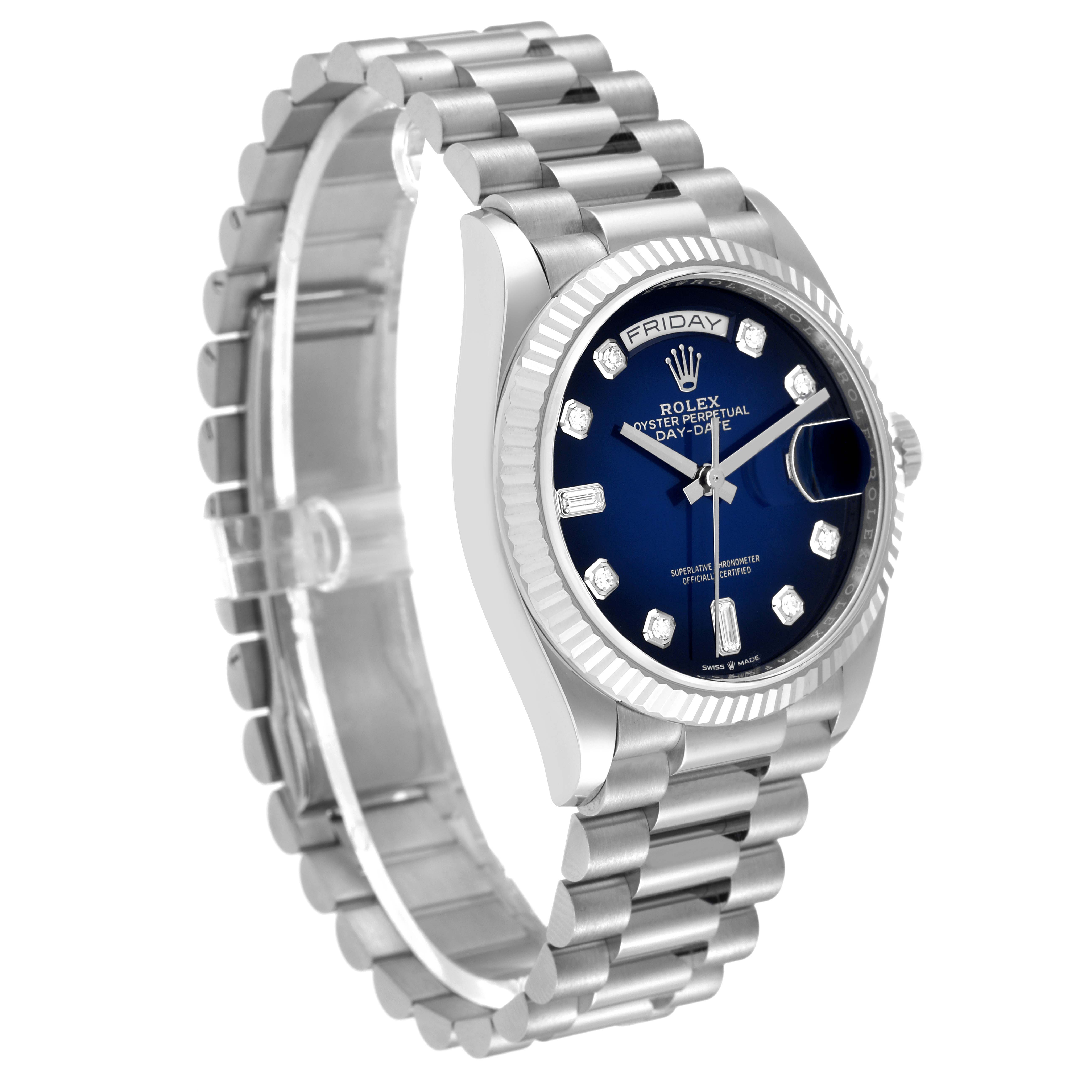 The image shows a Rolex President 128239 Men's White Gold Blue Dial 128239 Men's White Gold Blue Dial model watch at a slight angle, displaying the bracelet, case, blue dial, and fluted bezel.
