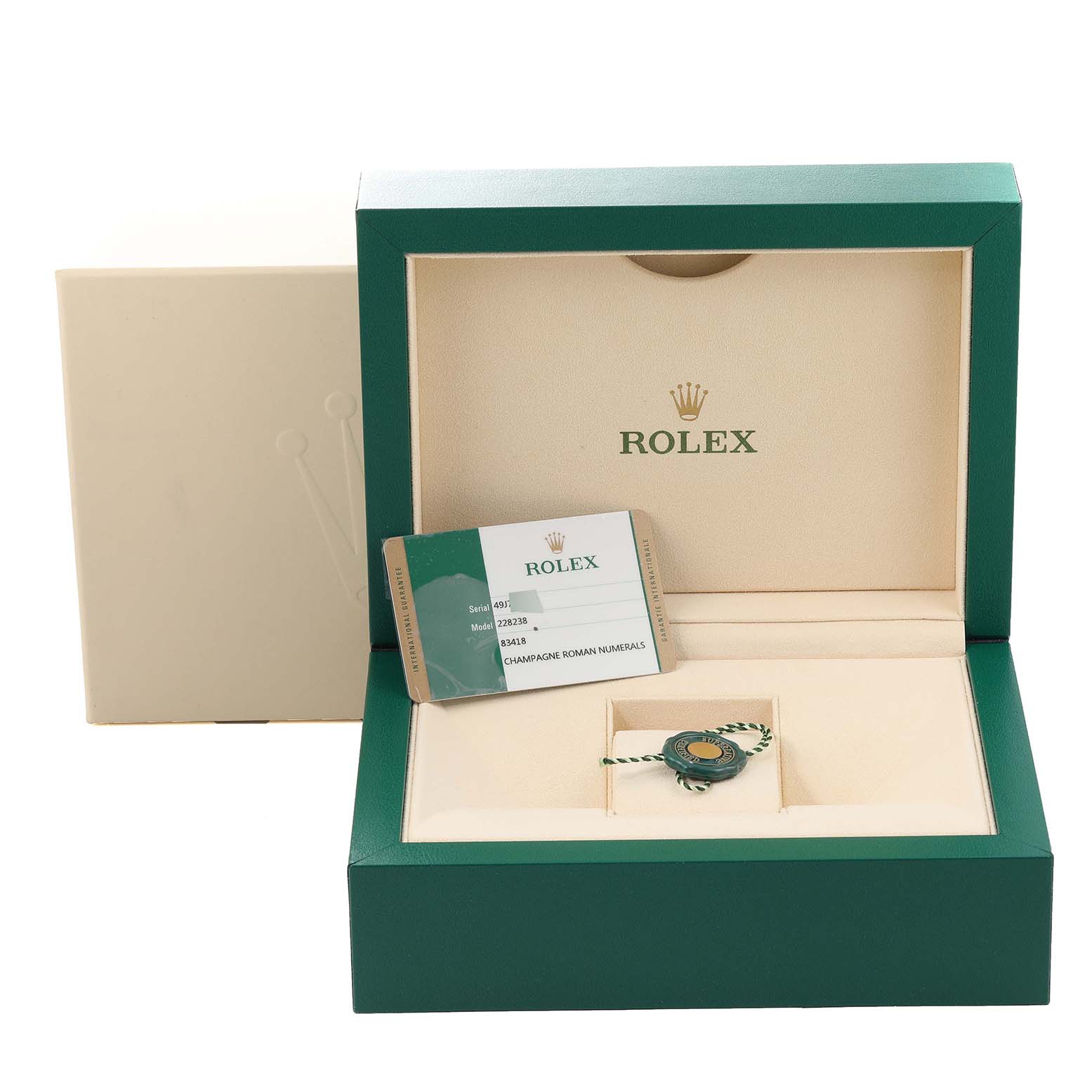 The image shows an open Rolex President 228238 Men's Yellow Gold Champagne Dial 228238 Men's Yellow Gold Champagne Dial model watch box with the warranty card and tag inside.
